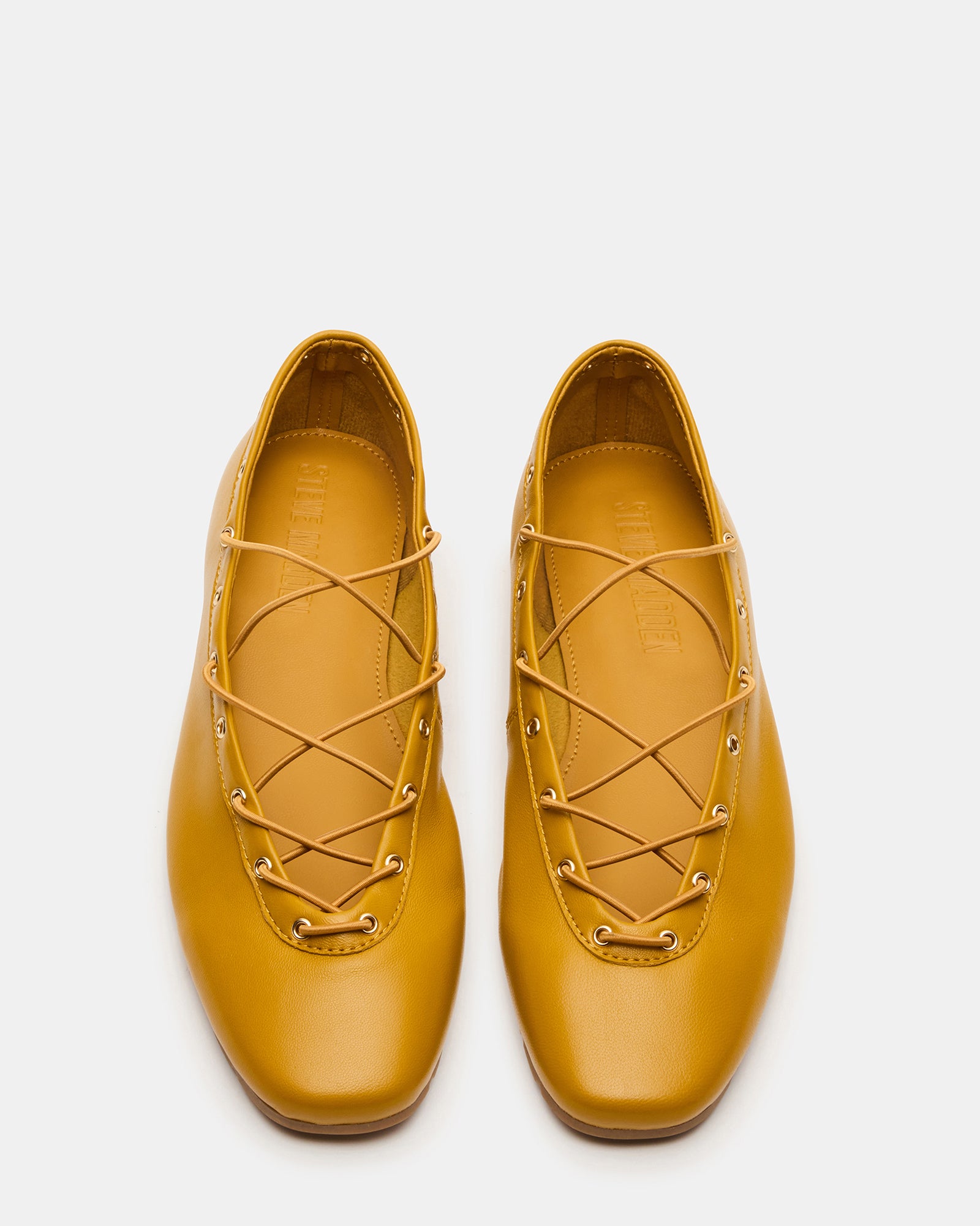 Close-up of leather flats showcasing the square toe design.