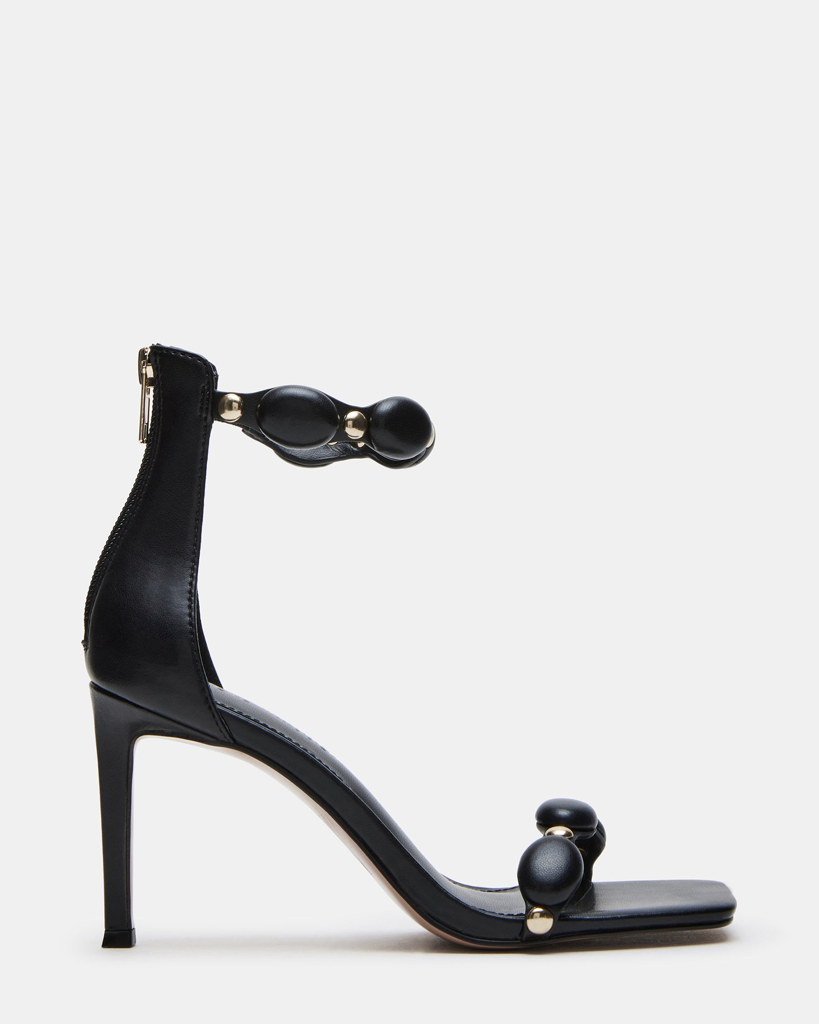 POISE black square toe heels styled with a chic dress