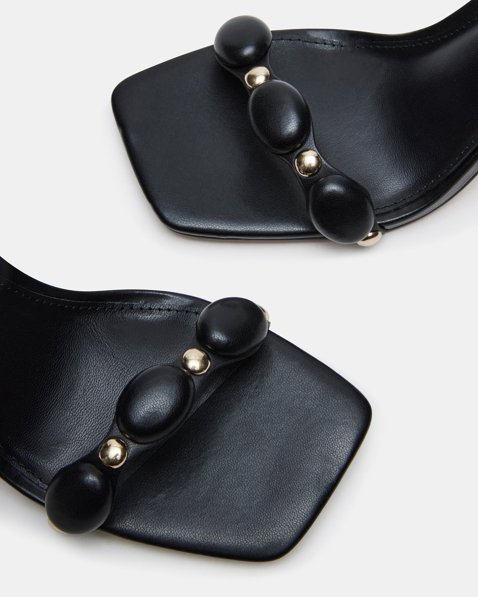POISE black square toe heels styled with a chic dress