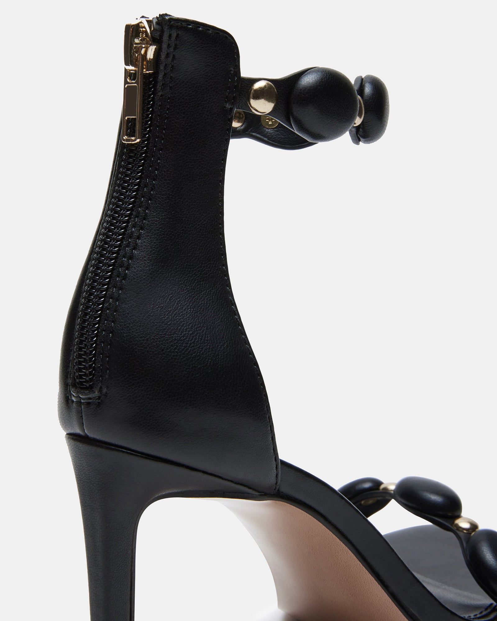 POISE heels paired with black skinny jeans for a night out