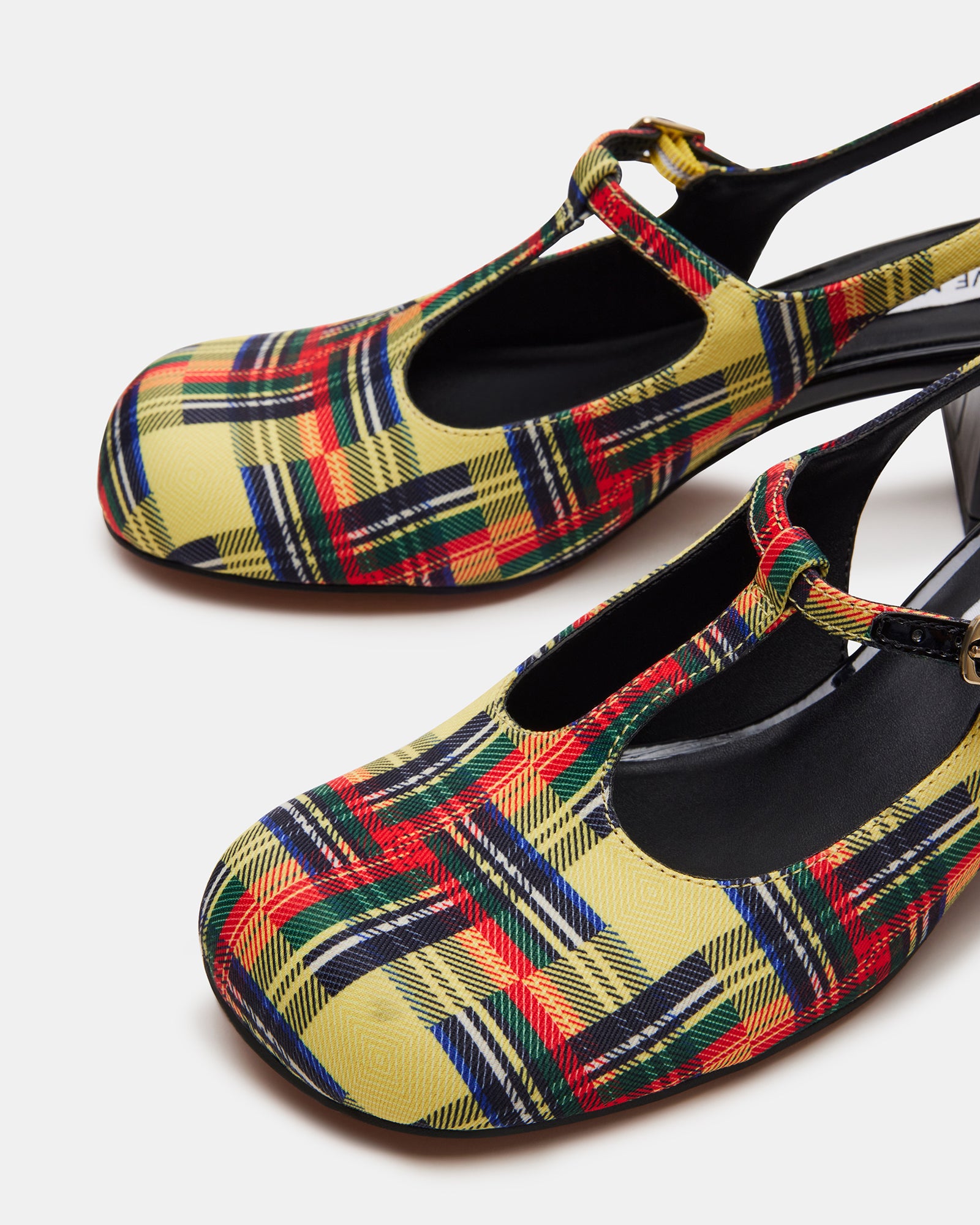 Styled image of black Mary Jane heels with comfortable heel and chic design