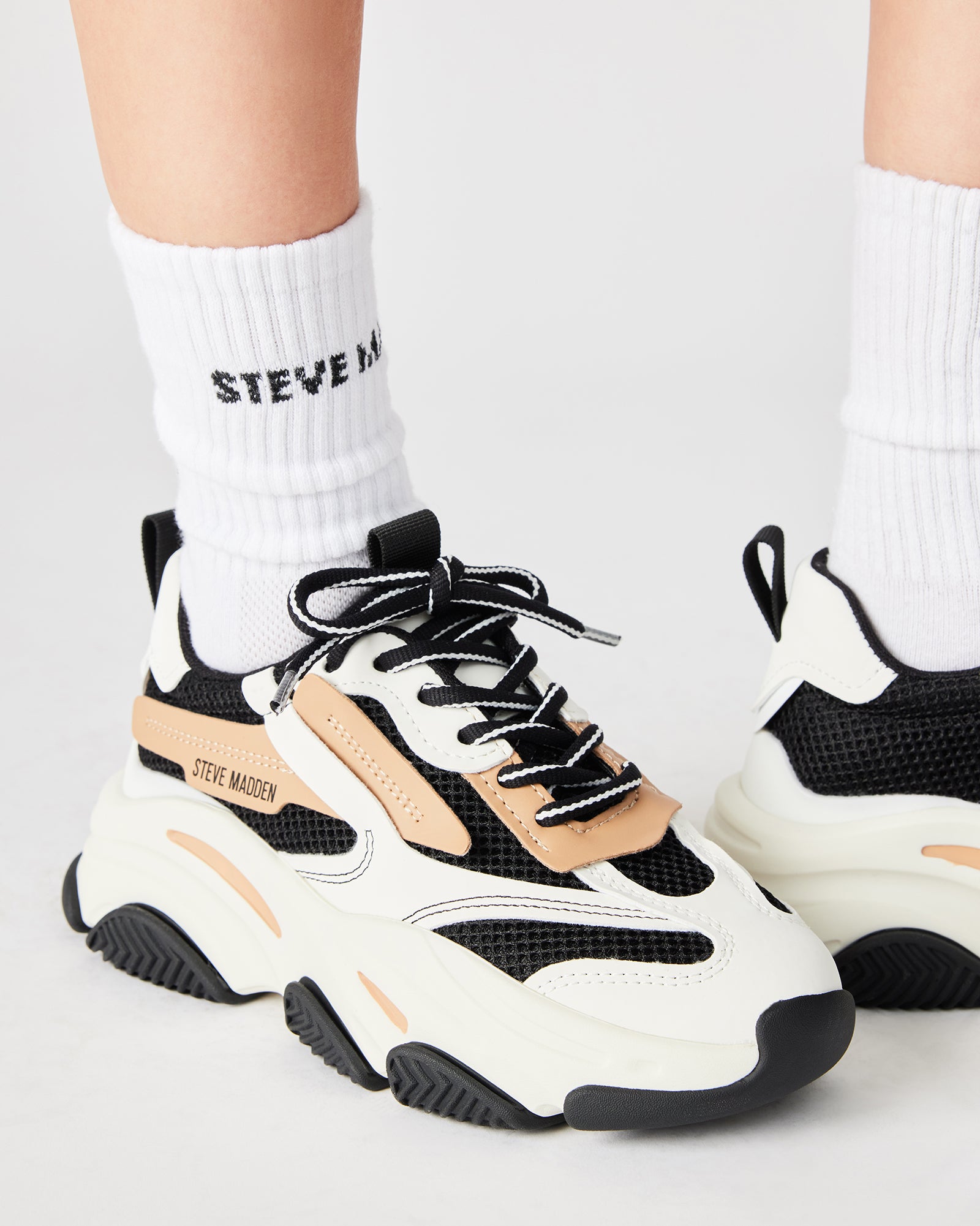 Top angle of dad sneakers highlighting cushioned heel height