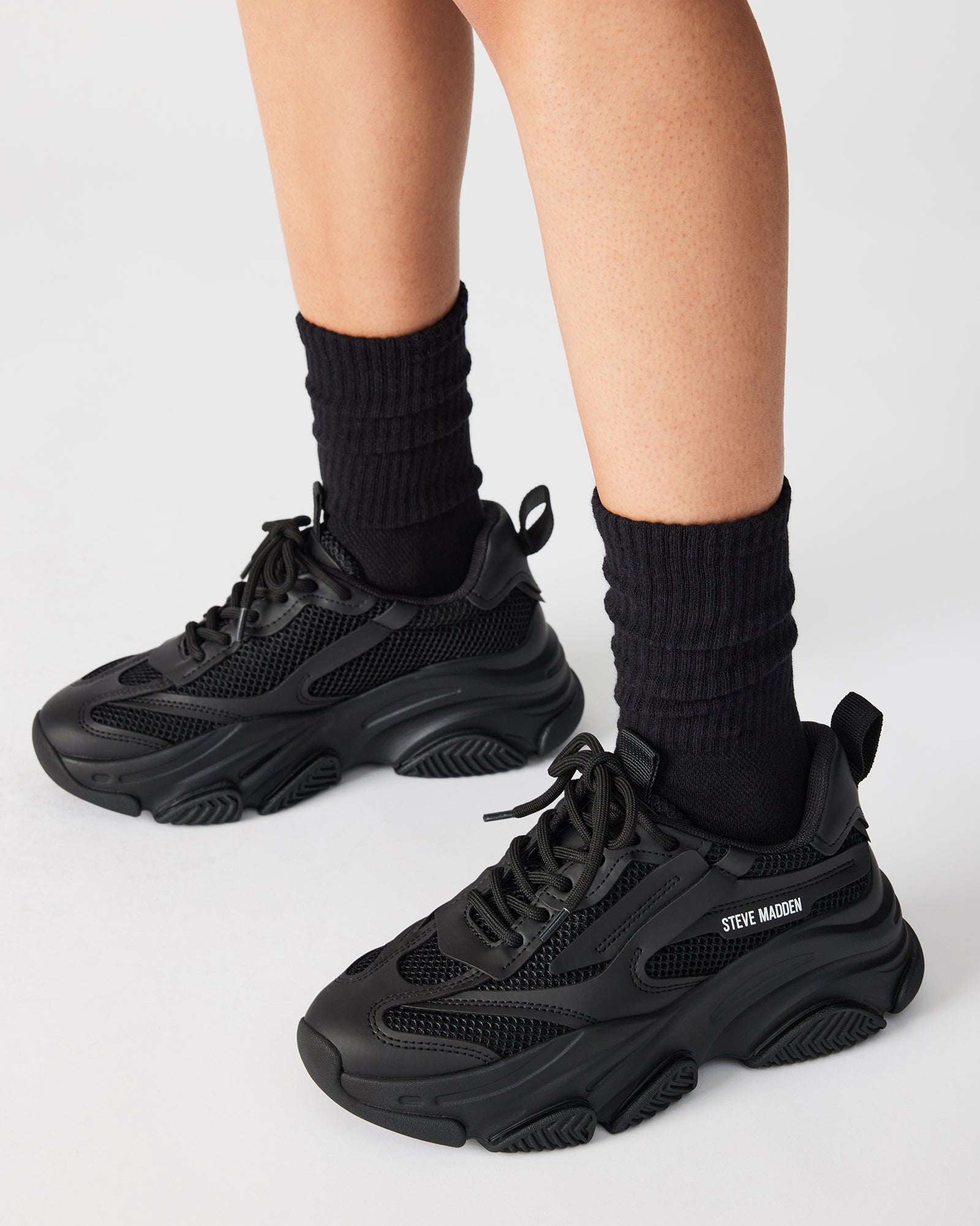 Action shot of comfortable sneakers for nurses worn with scrubs in hospital corridor