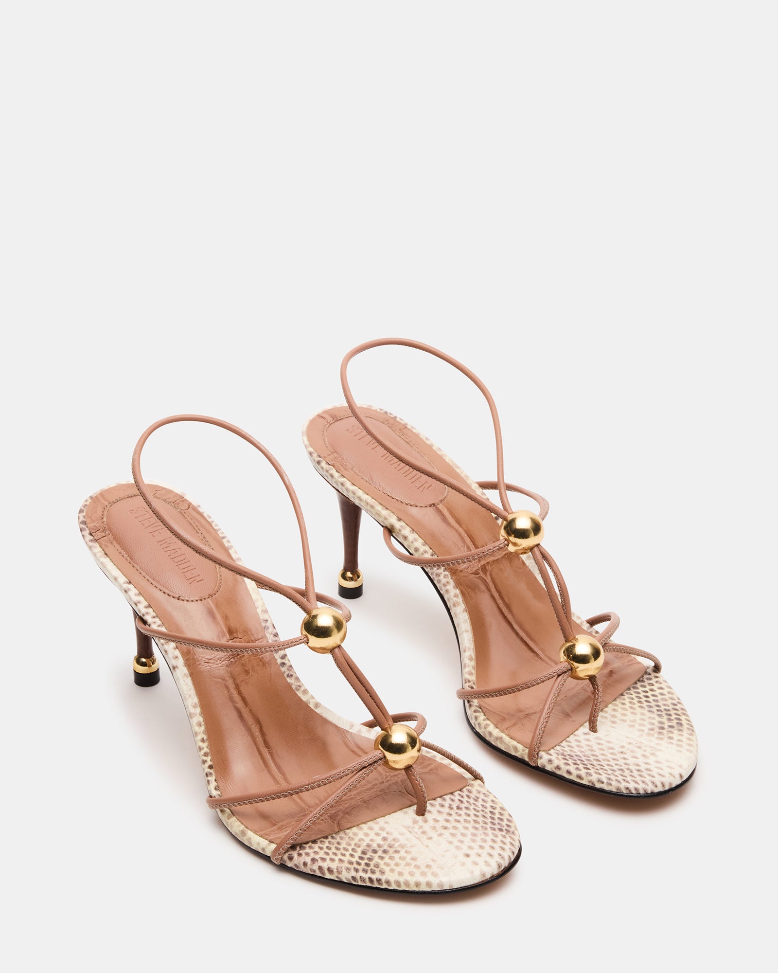 Close-up of the strap and heel detail on RAMOS stiletto shoes