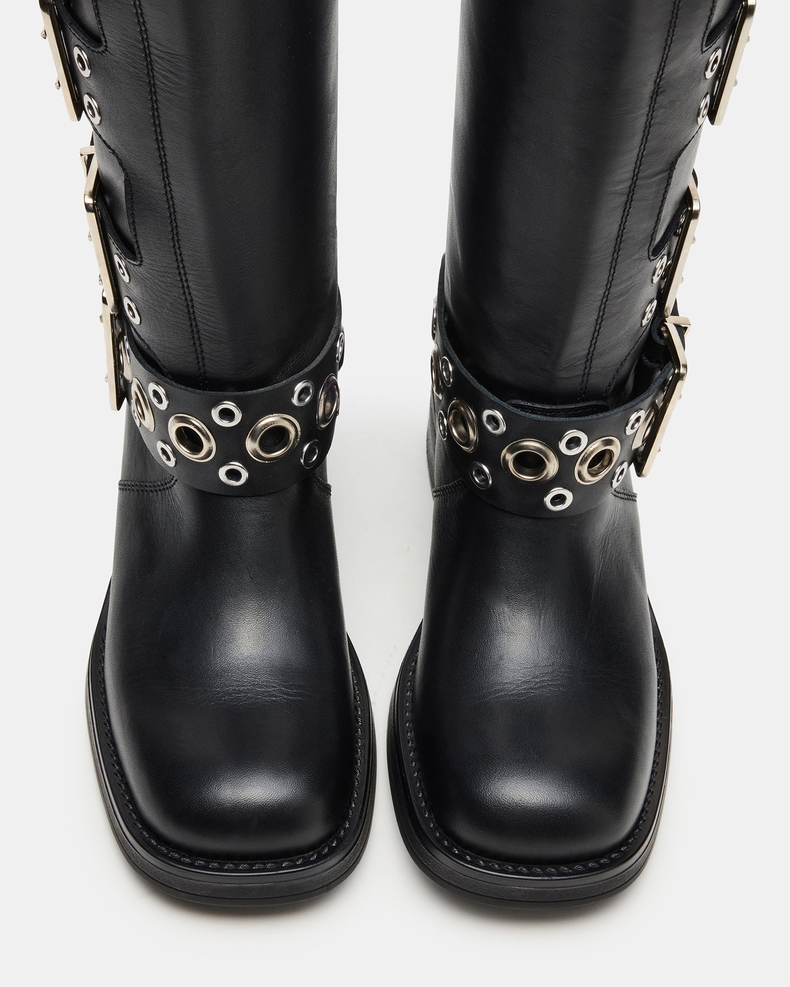 Close-up of the RAMPAGE black leather moto boots showcasing the square toe and buckle detail.