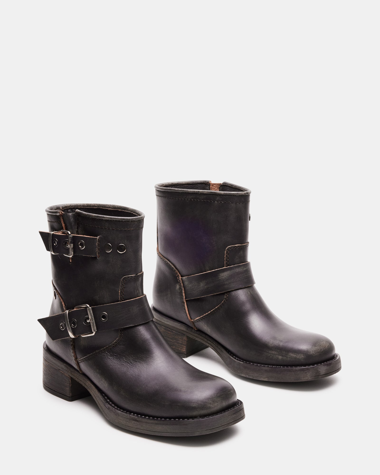 Top-down view of black moto boots variant with signature stitching
