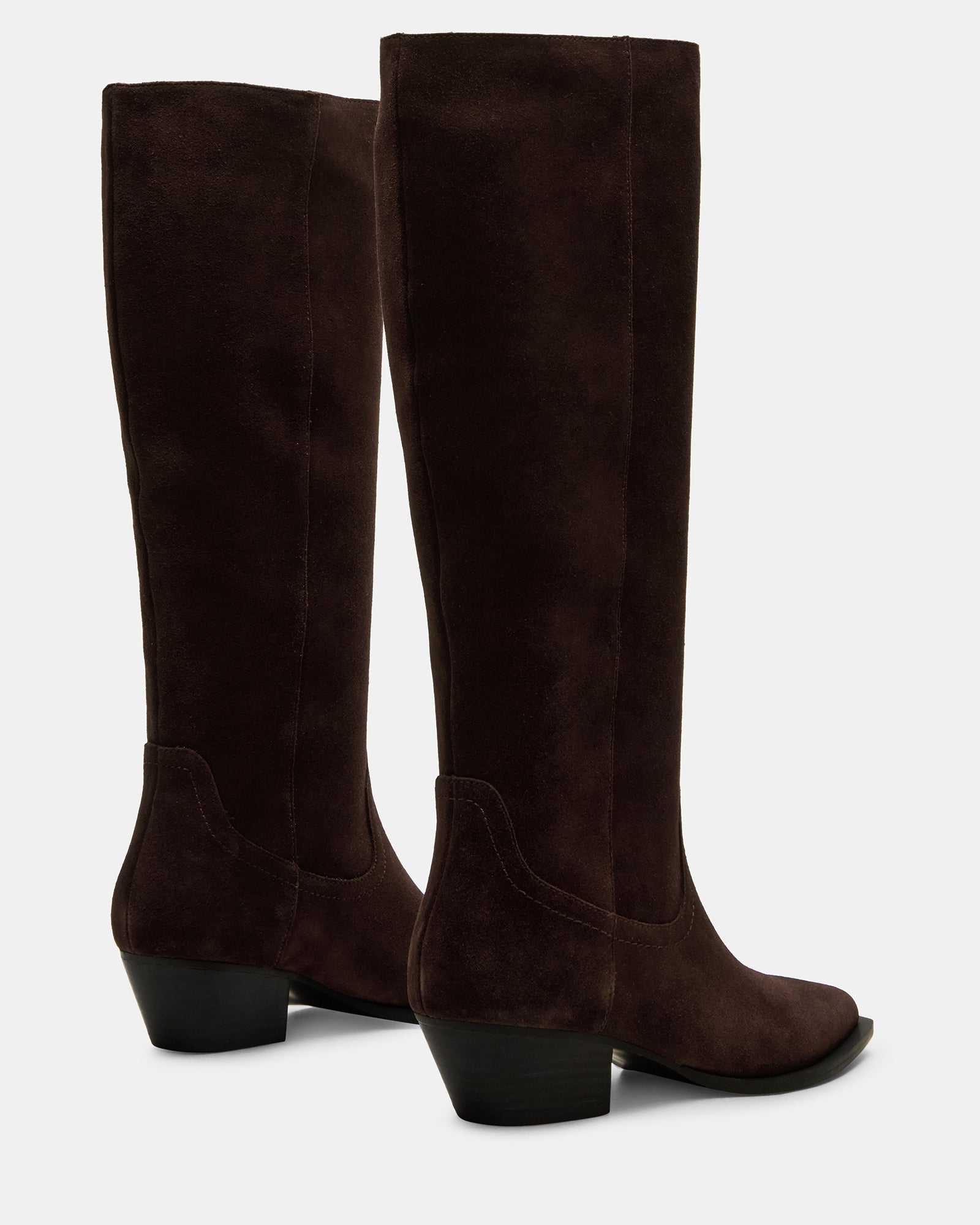 Close-up of pointed toe on fashion boots with rich suede texture