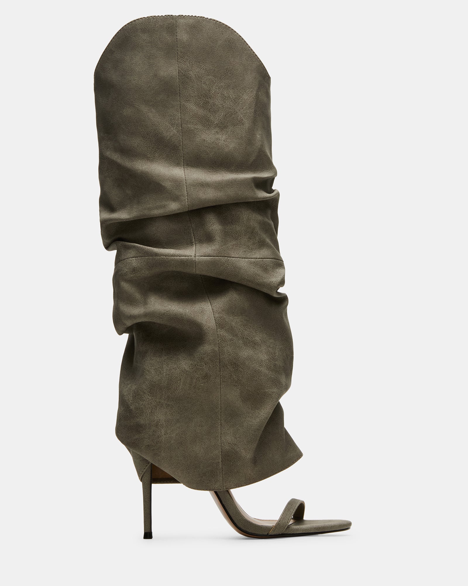 Grey distressed knee-high boots with open toe and stiletto heel on a model's foot