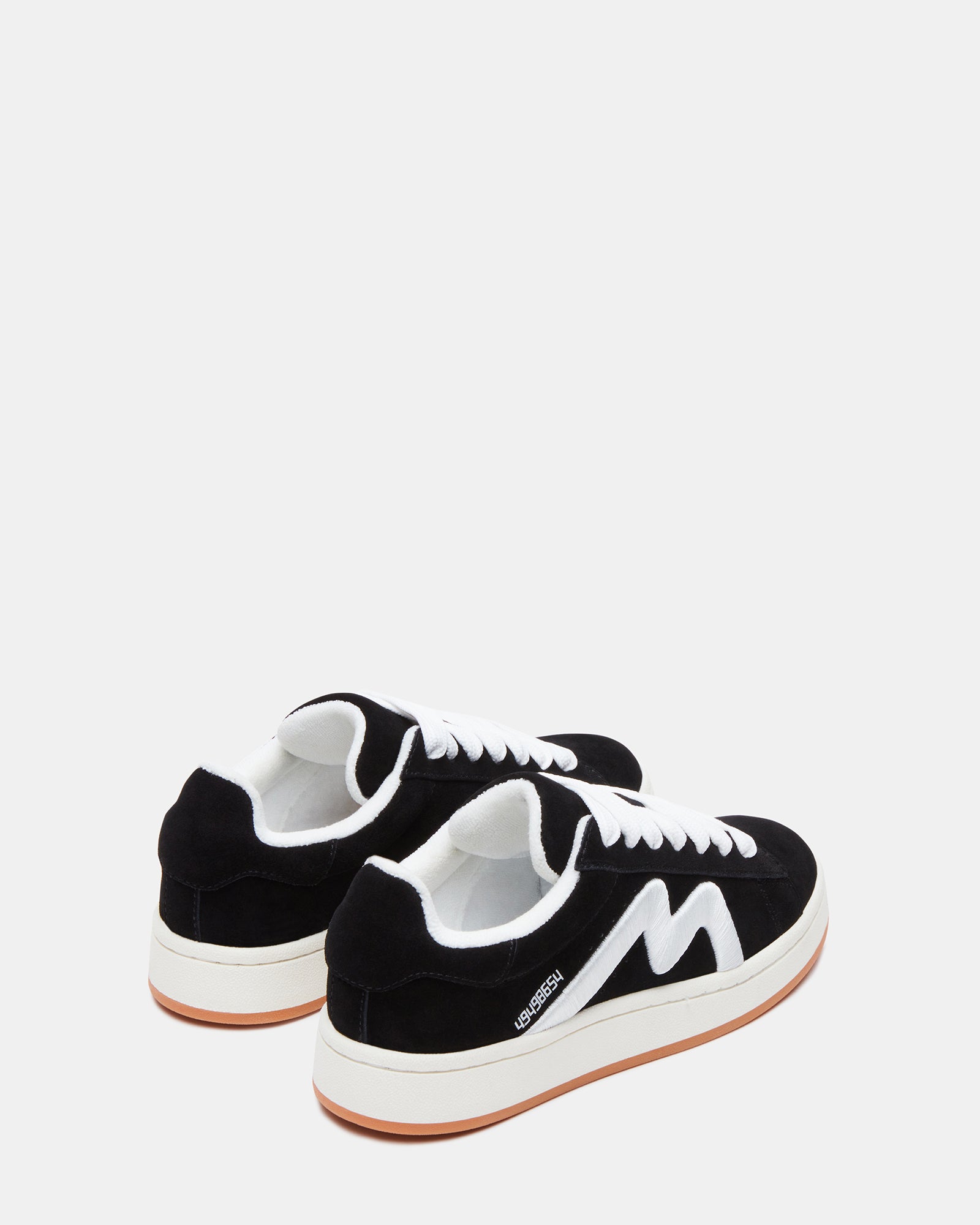 Razzle low top sneakers showcasing the elegant black suede material.