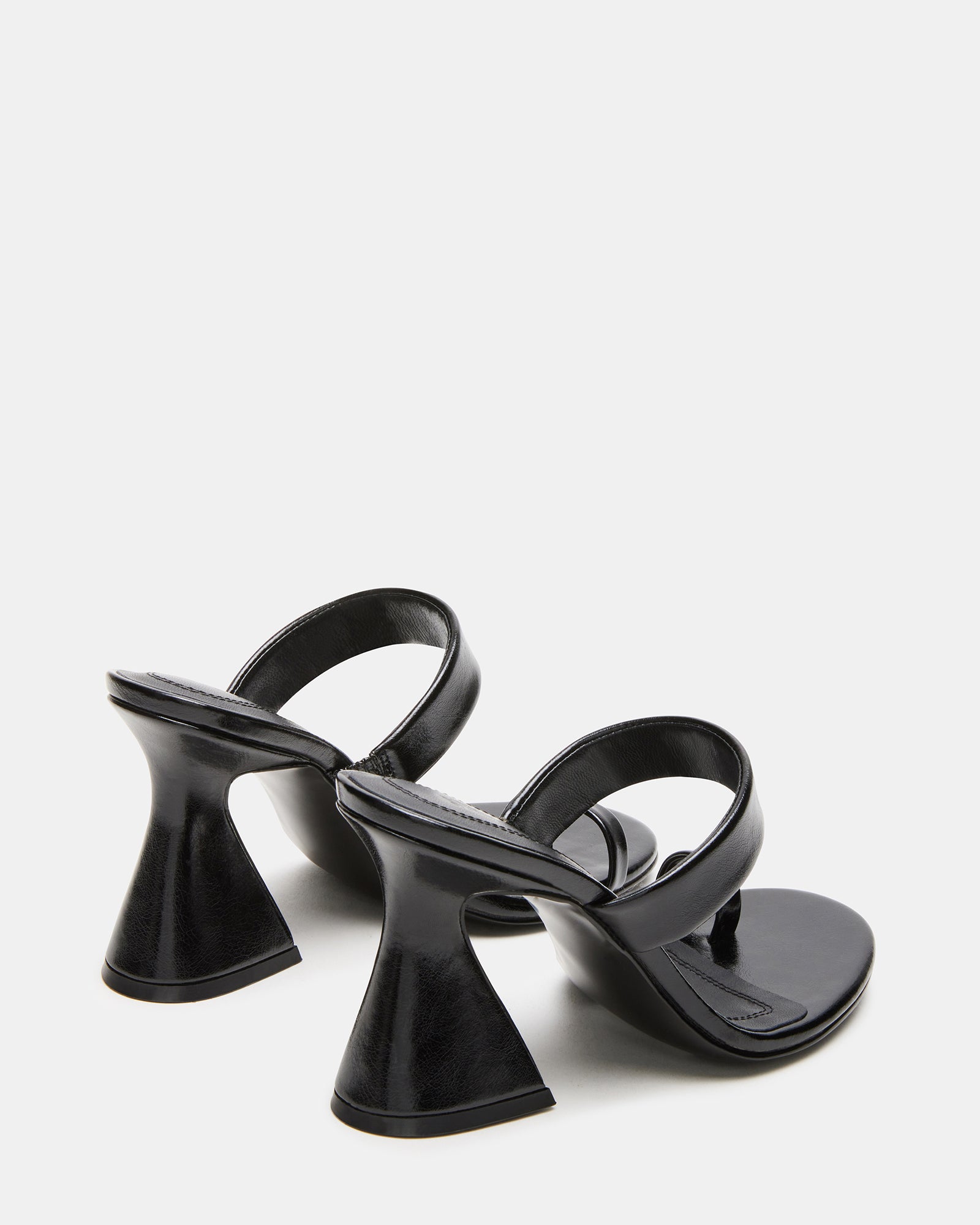 Styled outfit featuring RENIE black mule heels for women