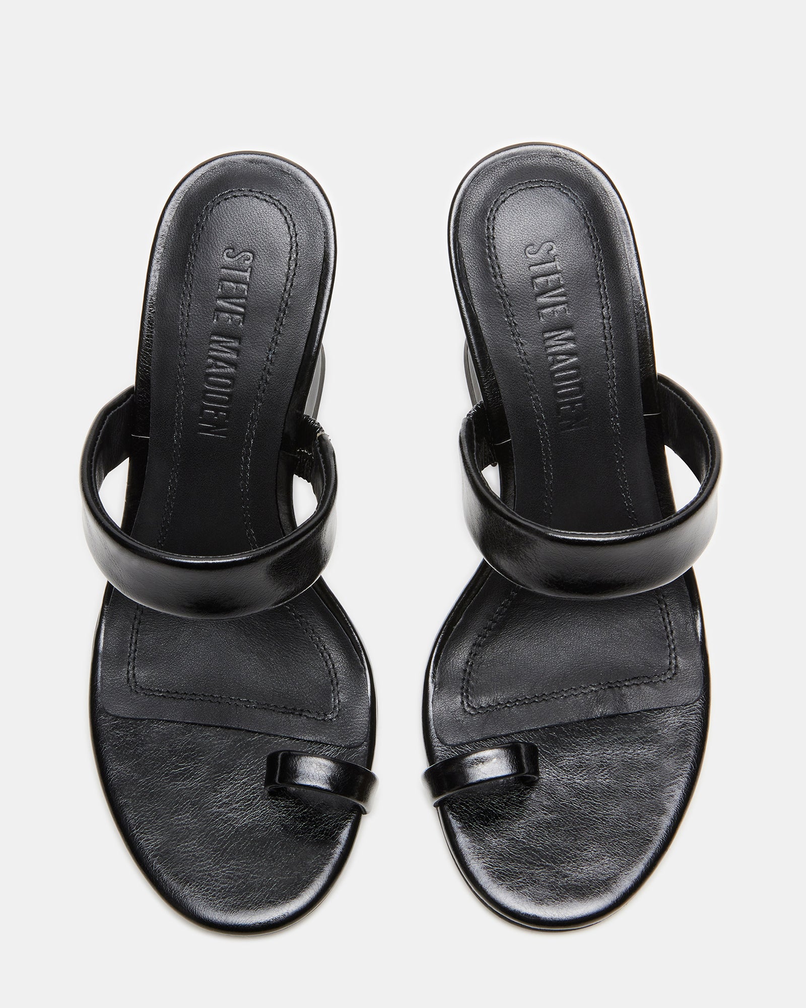 Side view of black mule heels with angular heel for women