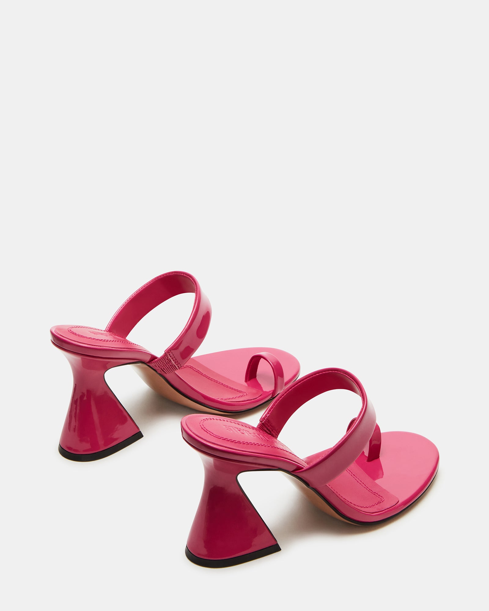 Close-up of kitten heel mules shoes emphasizing the leather sock lining and rounded toe