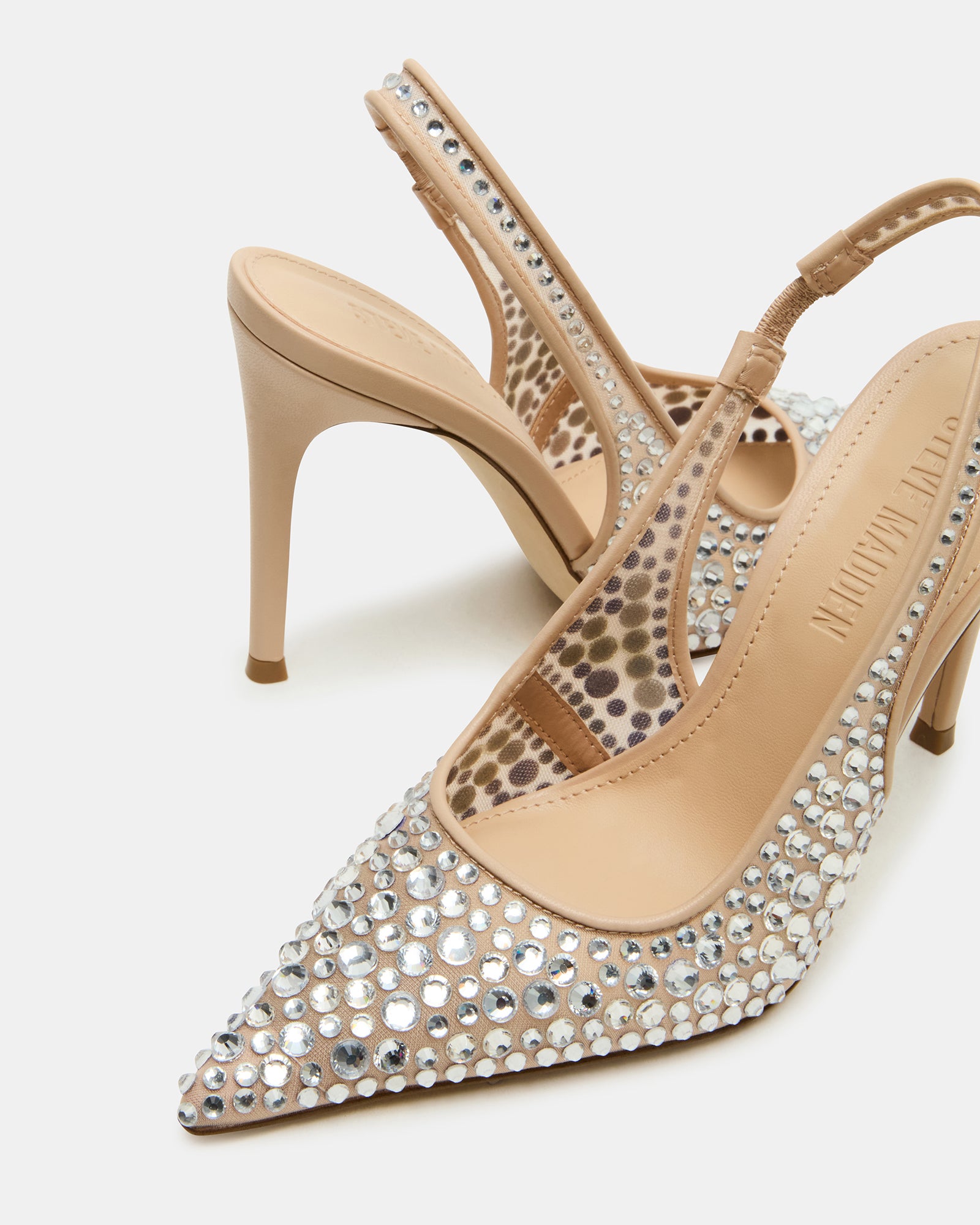 Close-up of Reyes rhinestone slingback heels showcasing sparkling details