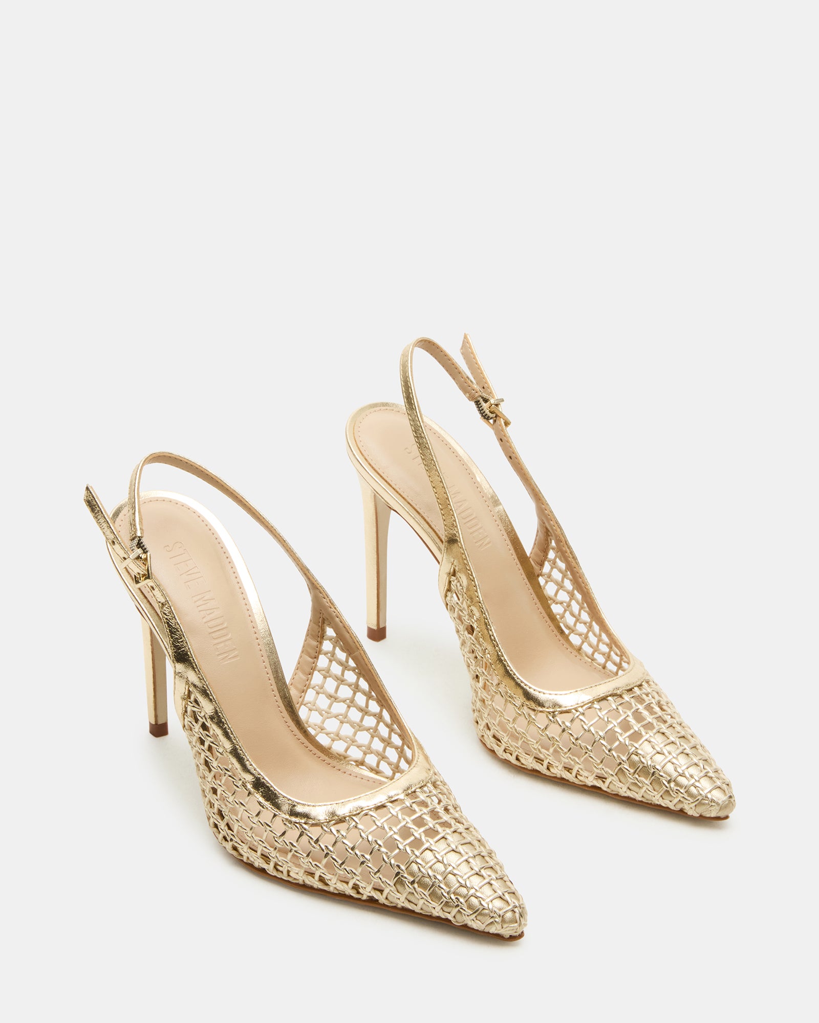 Side view of slingback pumps on a model, highlighting the 4.25-inch heel height