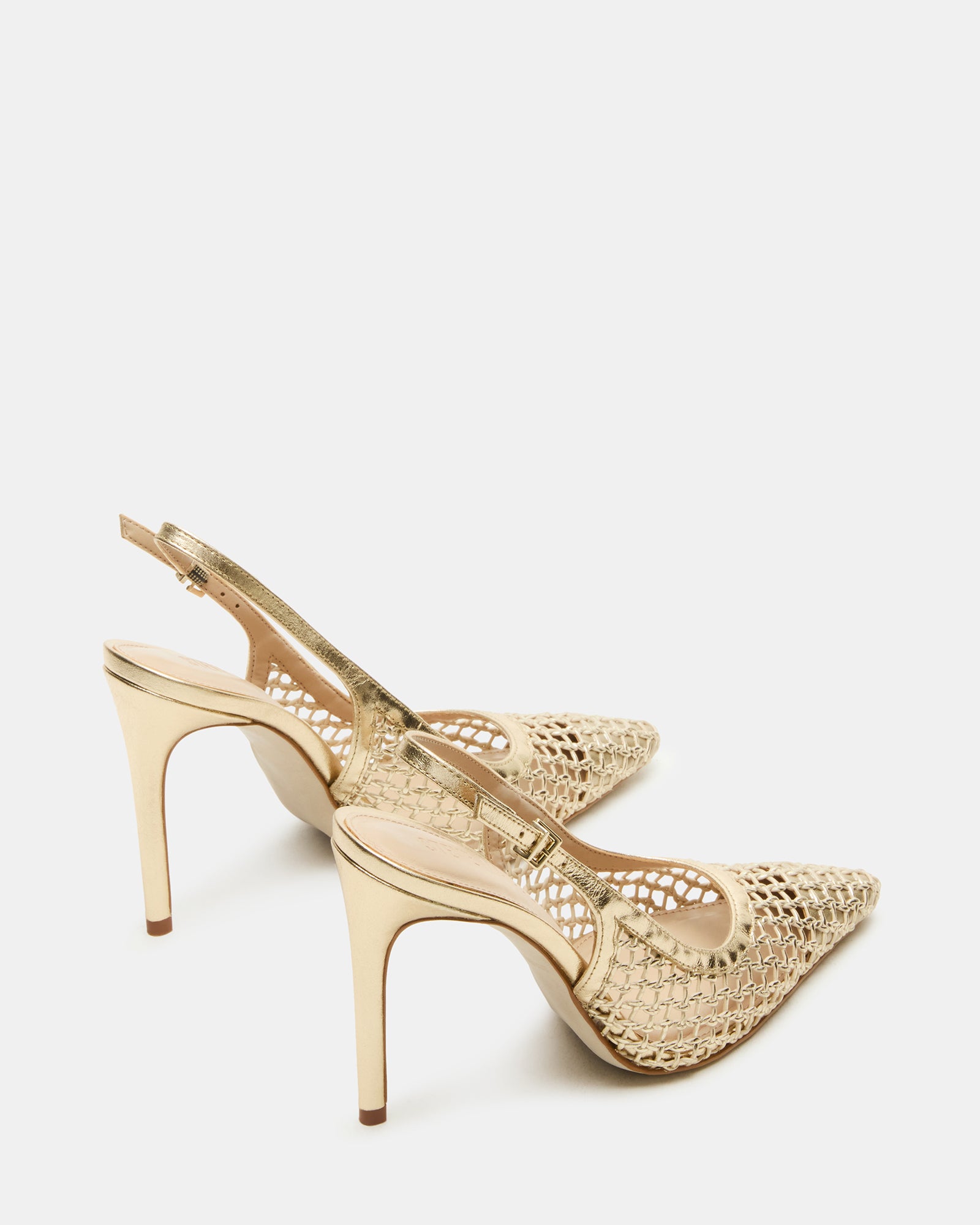 Side view of slingback pumps on a model, highlighting the 4.25-inch heel height