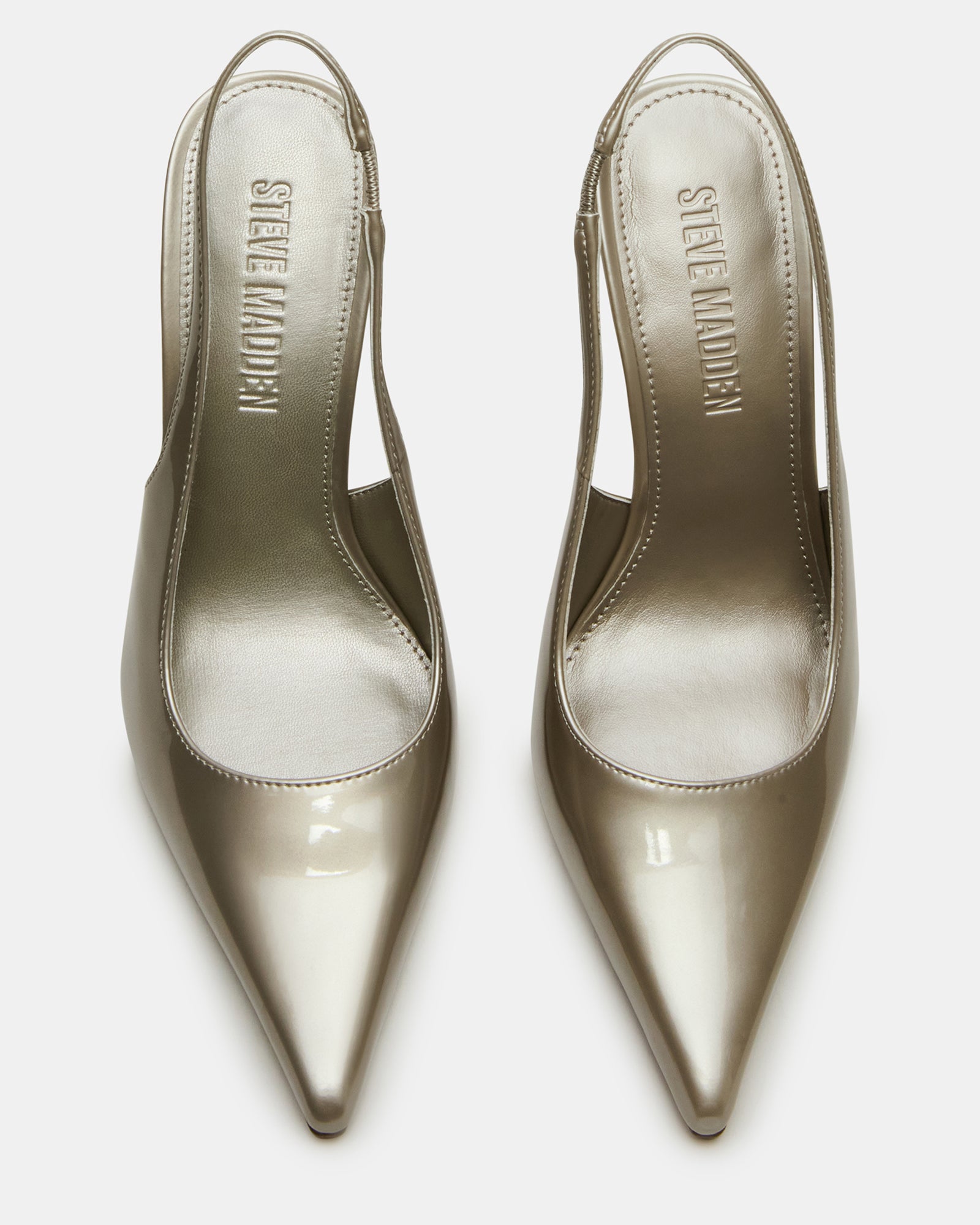Side view of Reyes Champagne slingback pumps showcasing pointed toe and stiletto heel.