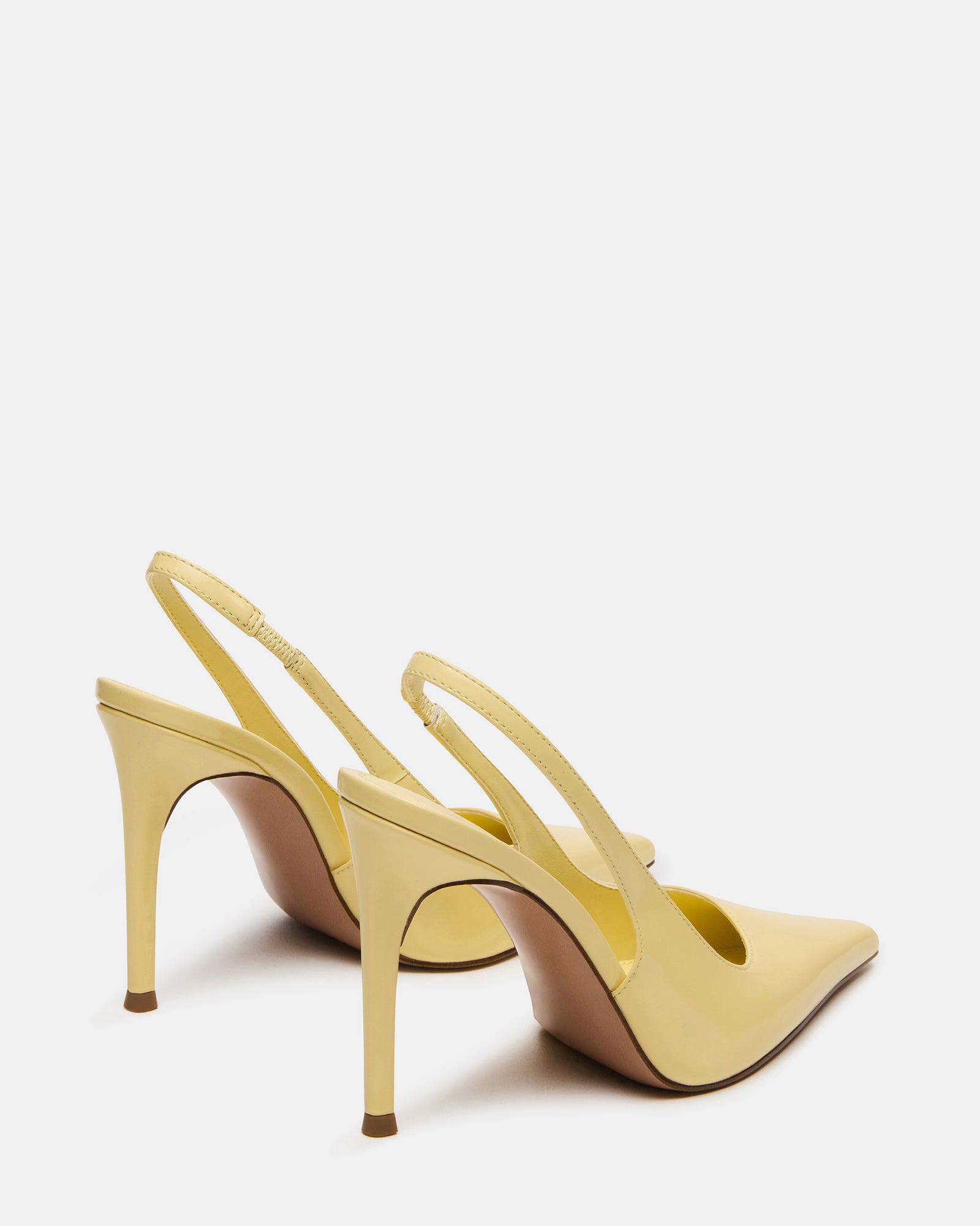 Close-up of pointed toe and leather texture on REYES pumps