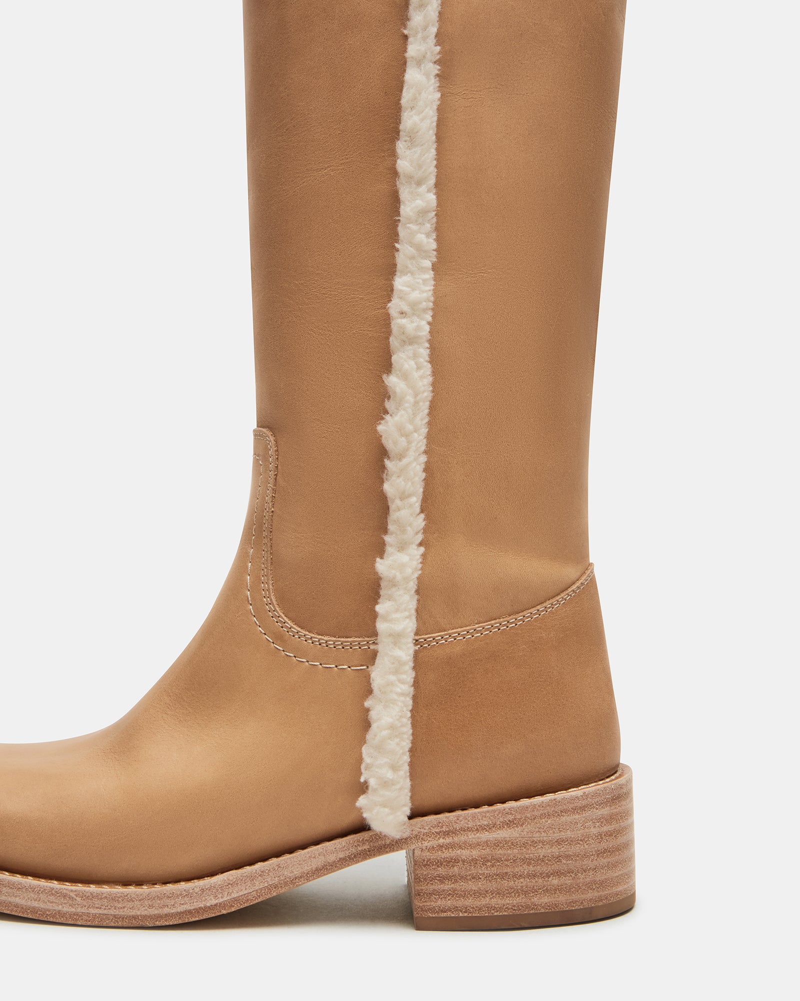 Riggs brown leather knee high boots with faux fur trim, front view