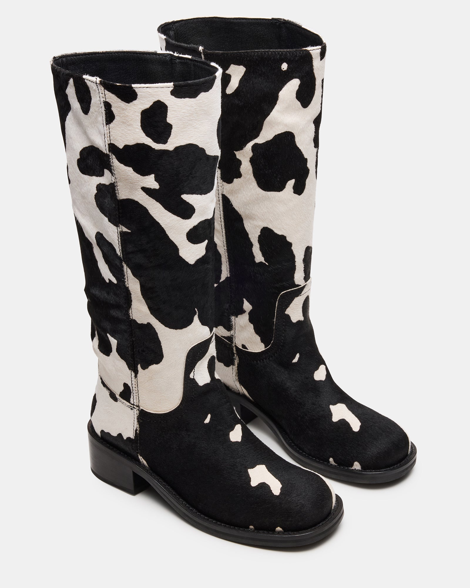 Close-up of the square toe design of the Riggs cow print boots