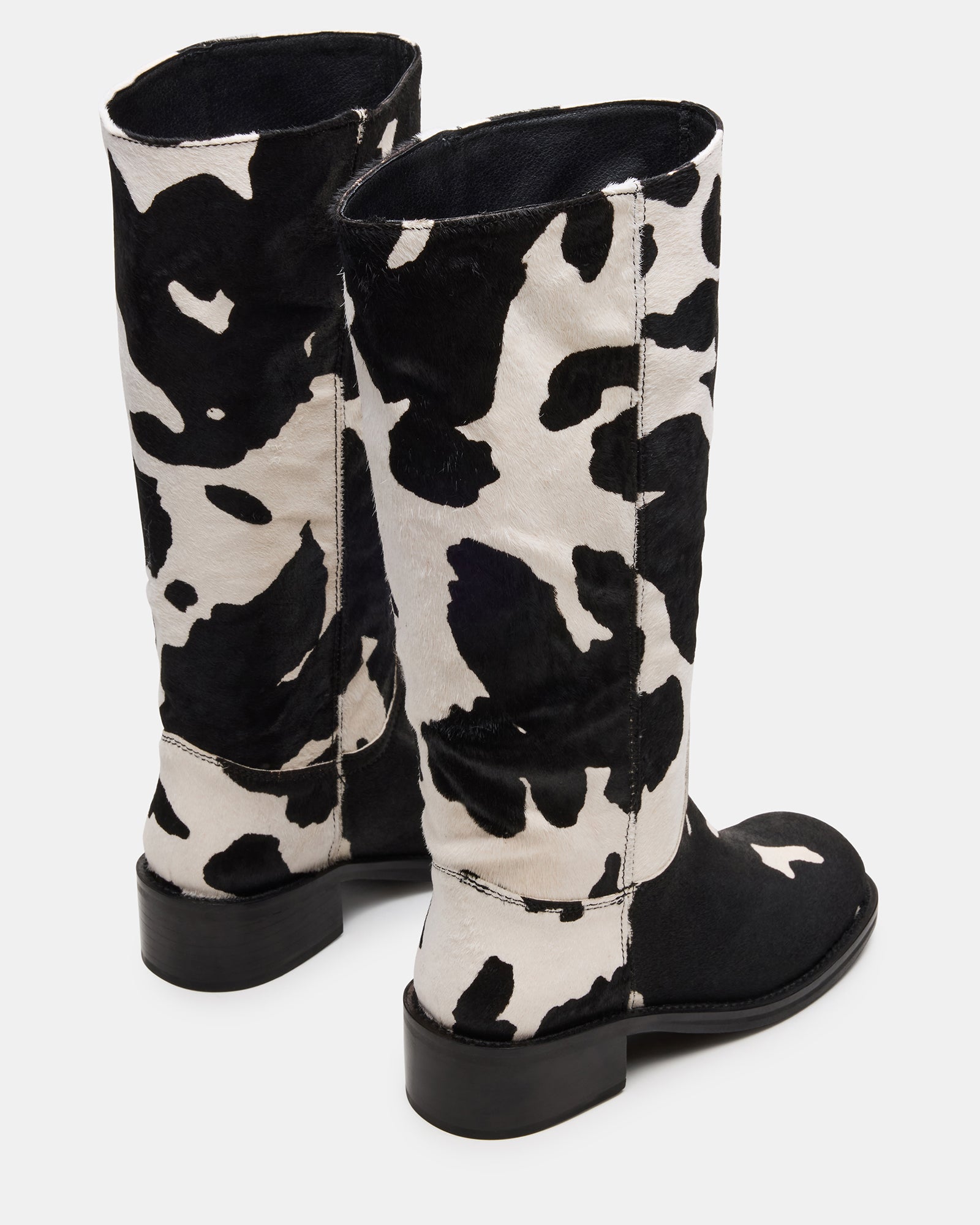 Close-up of the square toe design of the Riggs cow print boots