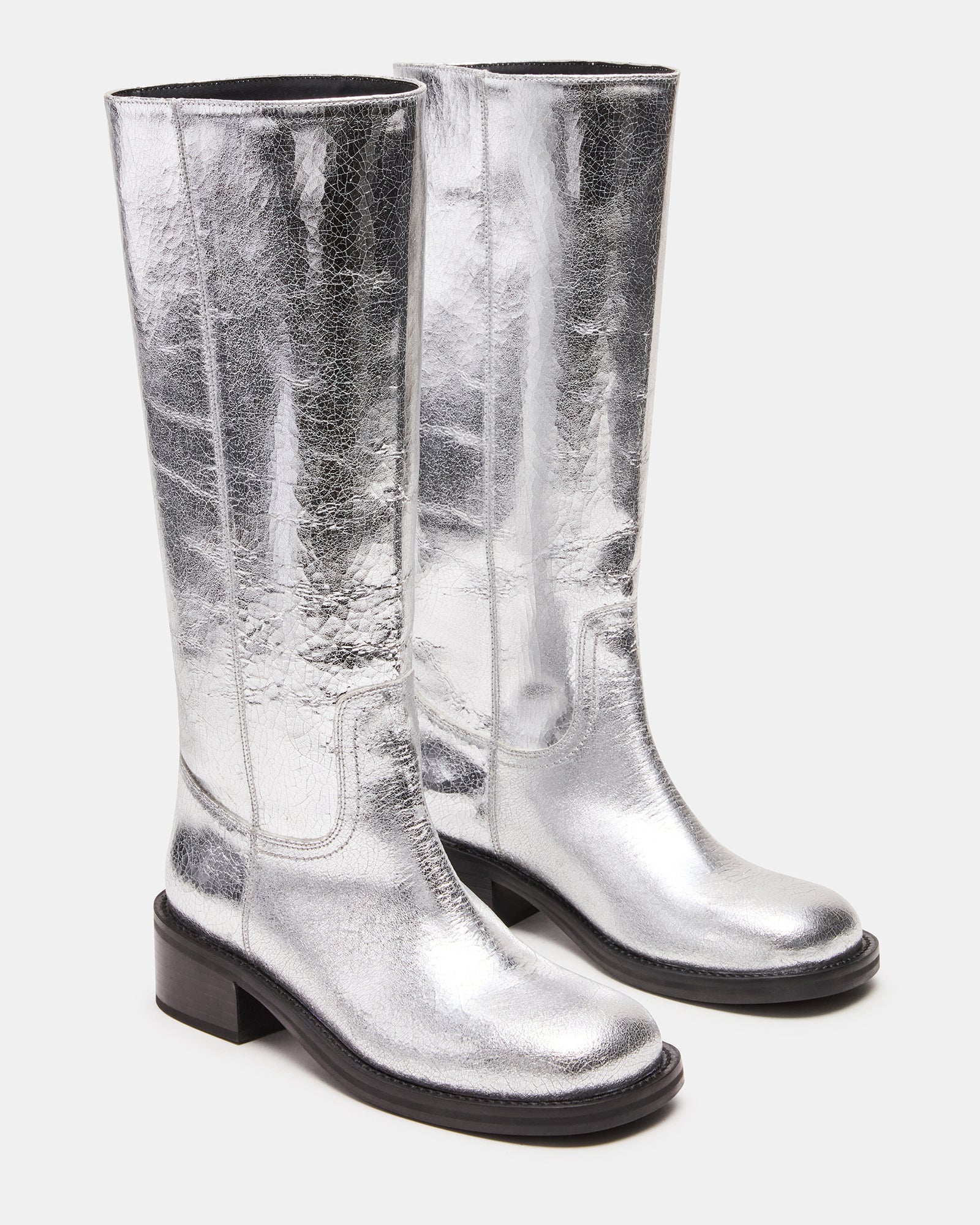 Close-up of the RIGGS silver leather boots highlighting the square toe and stitching details