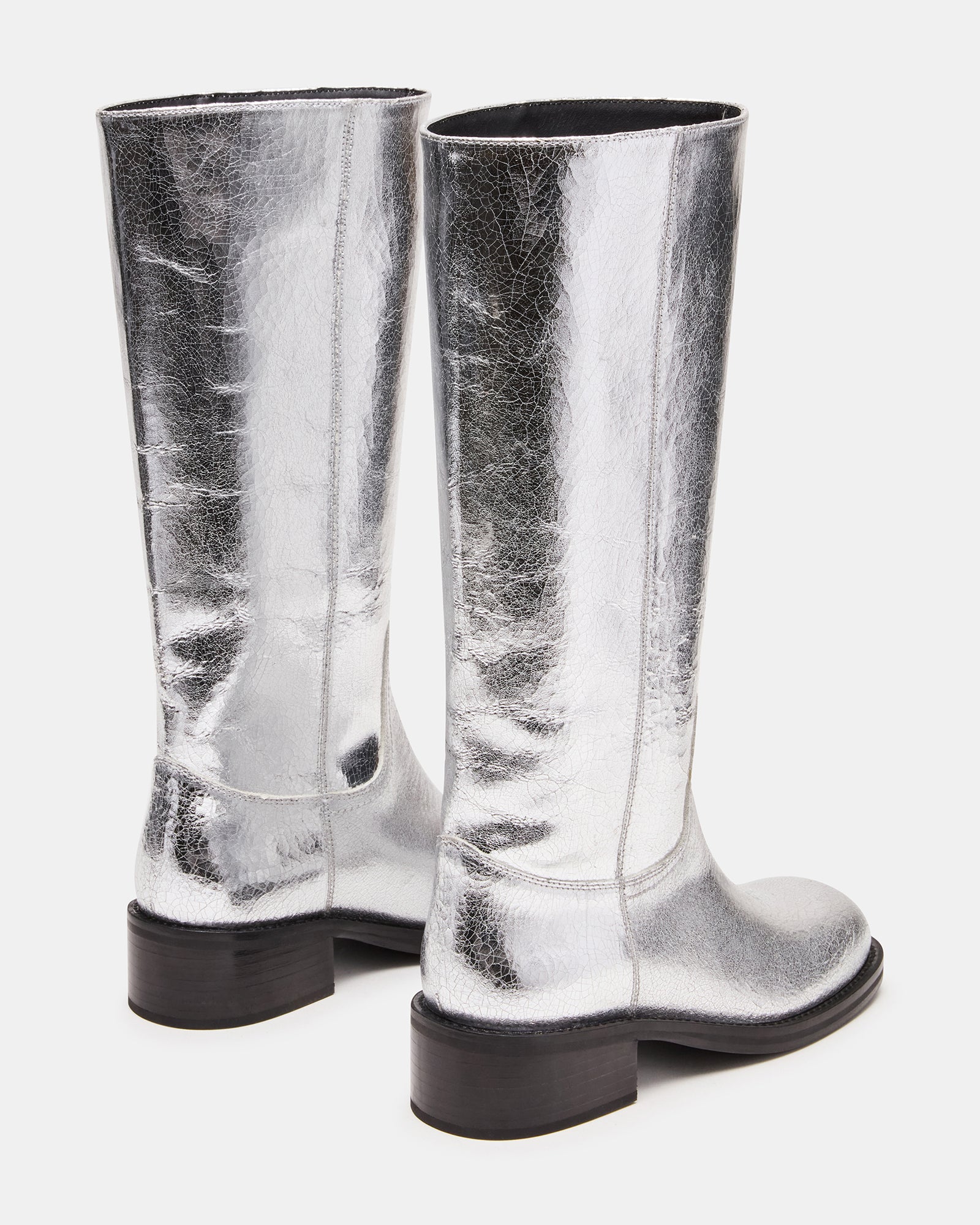 Close-up of the RIGGS silver leather boots highlighting the square toe and stitching details