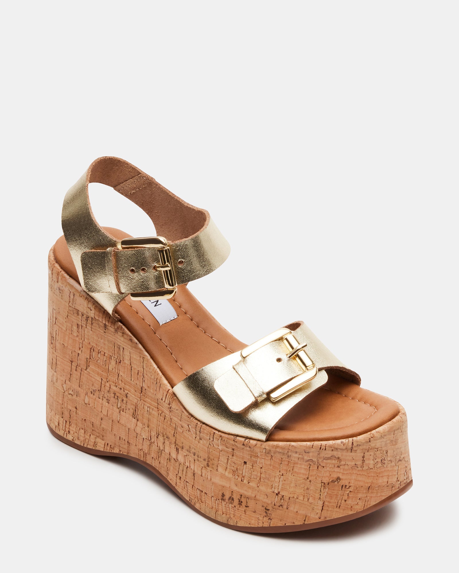 Close-up of the cork wedge and synthetic sole for traction.