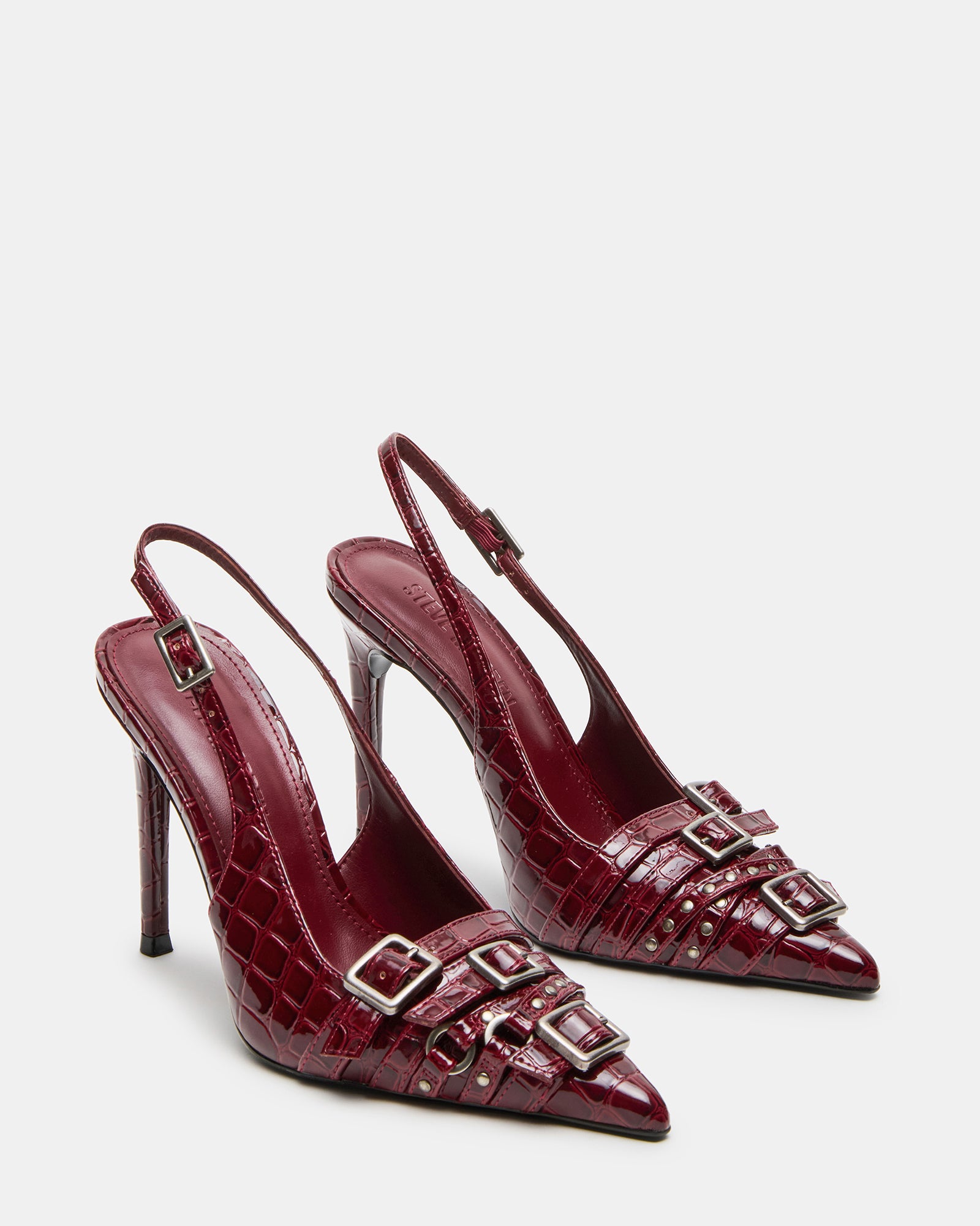 Model wearing RIVVY high heels in pink, highlighting versatile styling options