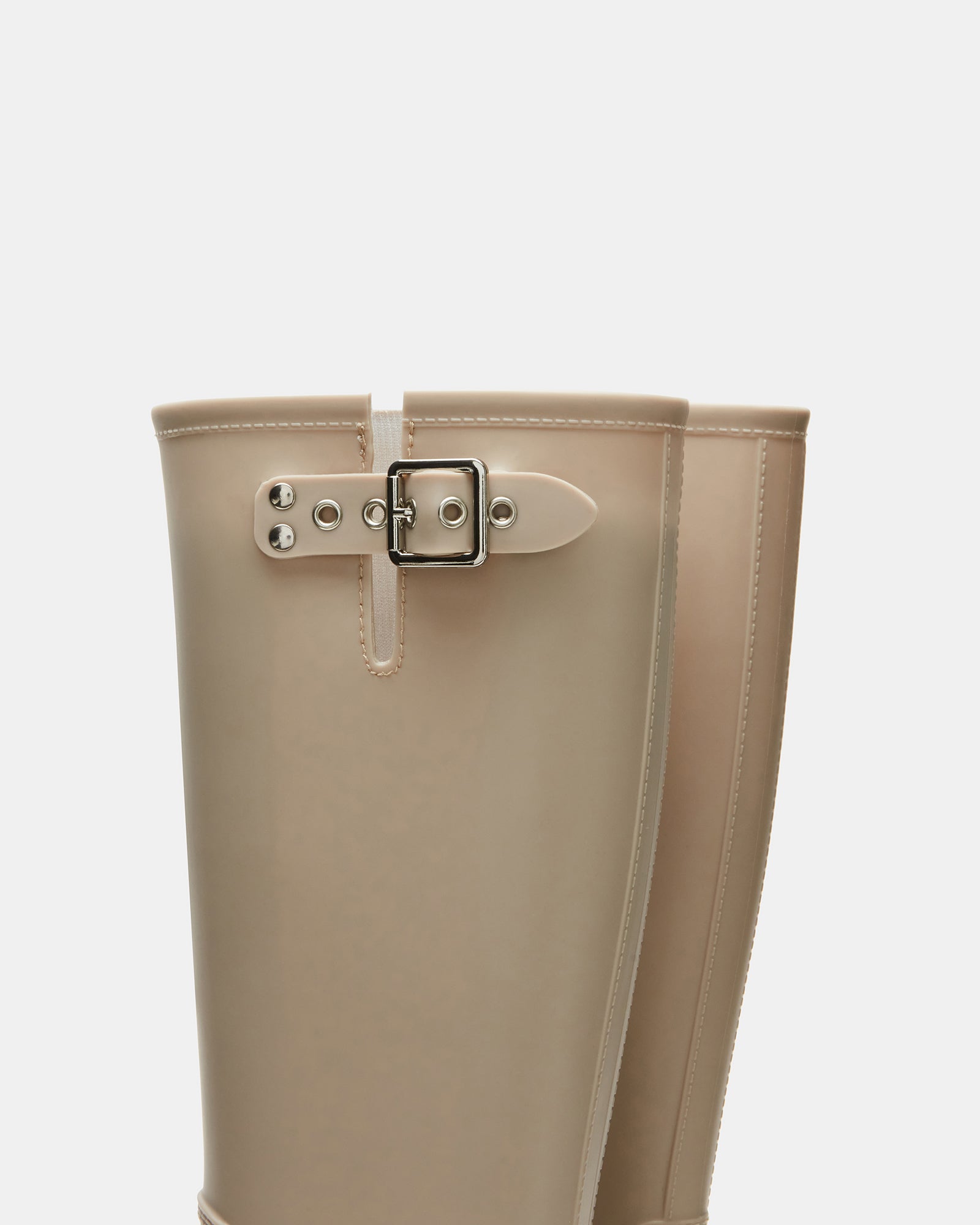 Side profile showcasing buckle detail and shaft height