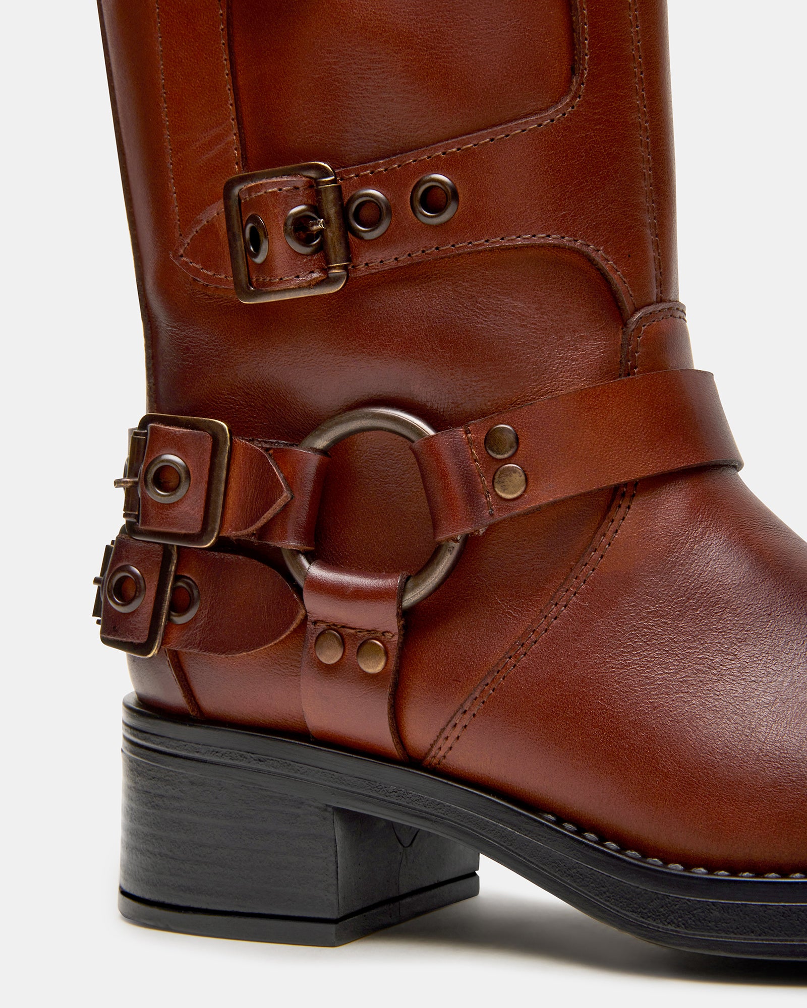 Side view of womens engineer boots showcasing the harness and buckle design.