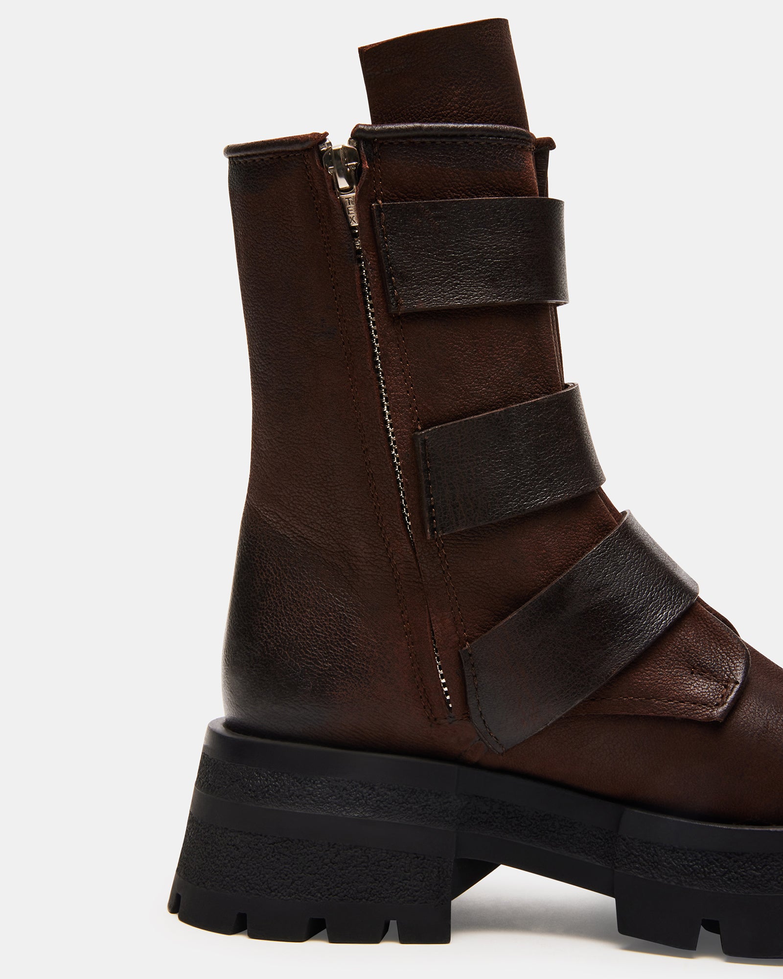 Roland brown leather boots side view, showing knee-high design