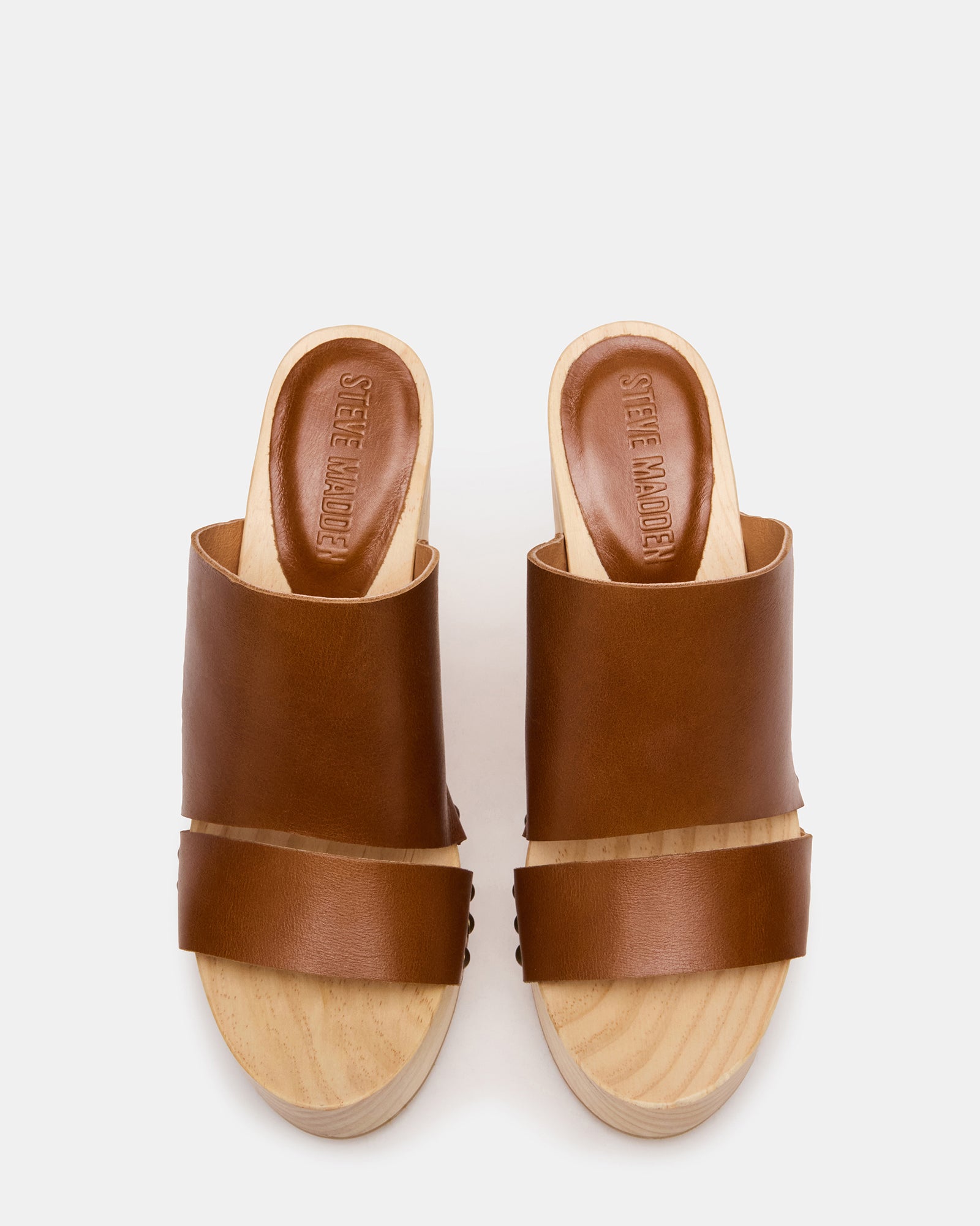 Rubble Tan leather platform sandals from the side, showcasing the wood bottom.
