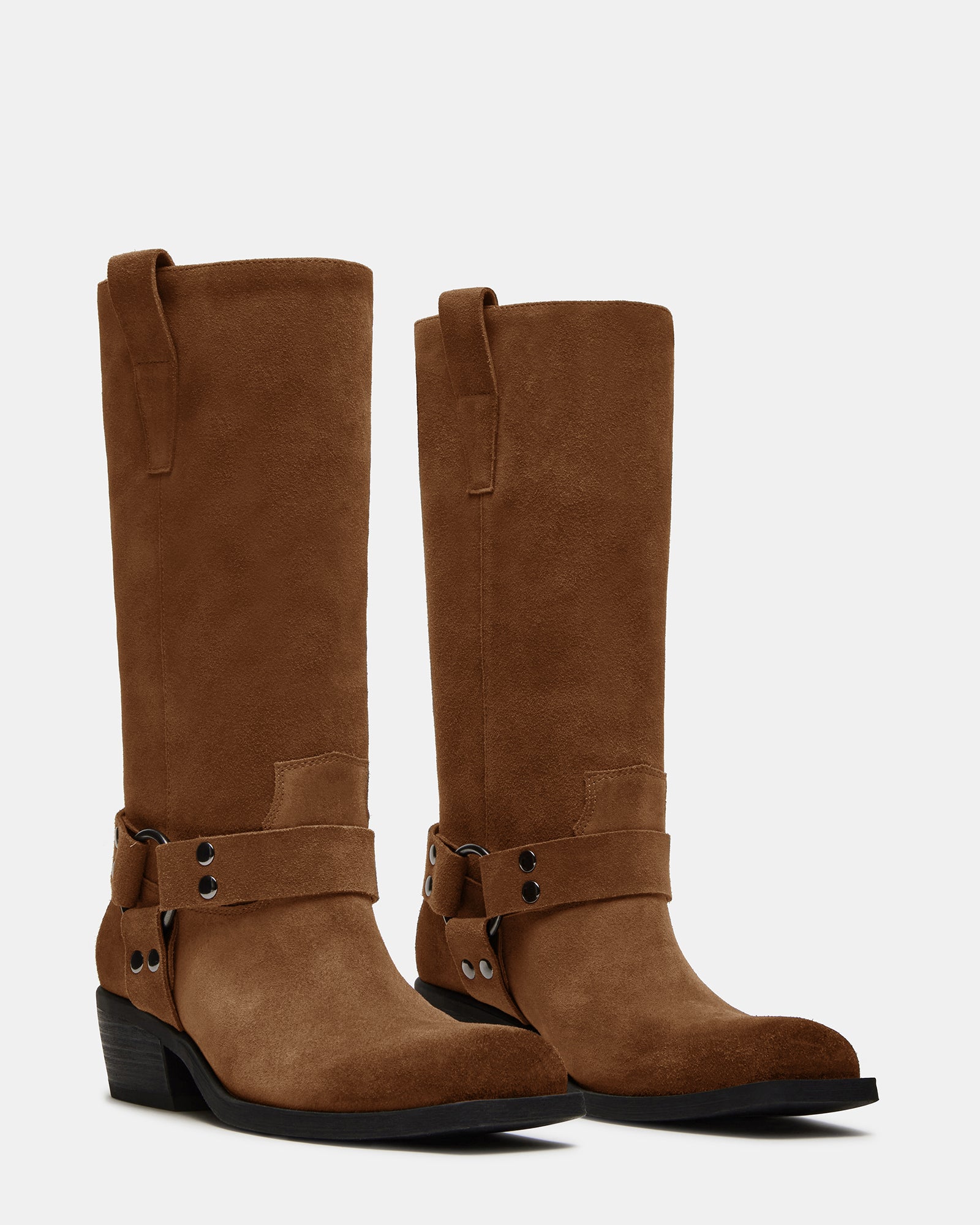 Moto boots detail showcasing textured suede and heel design