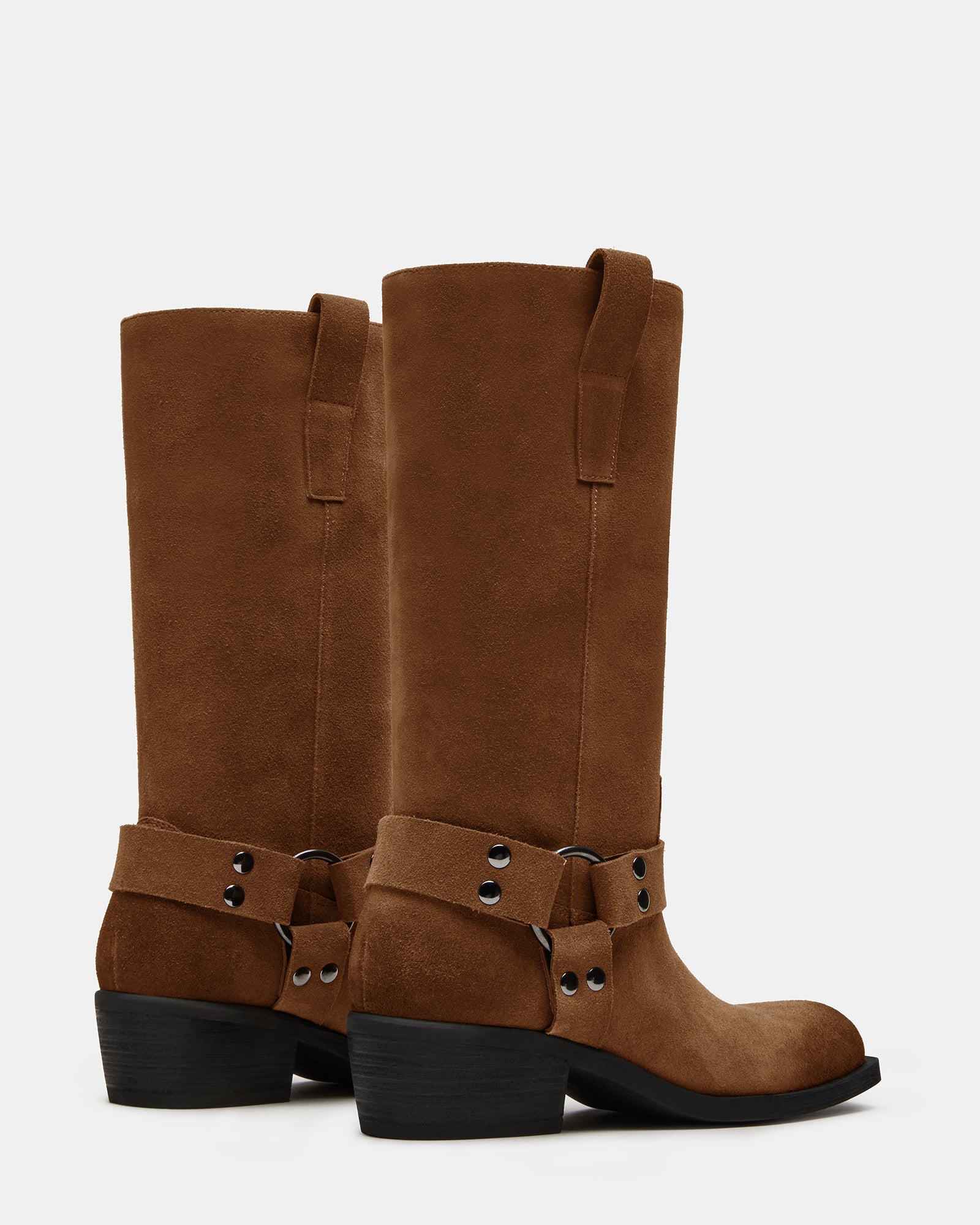 Moto boots detail showcasing textured suede and heel design