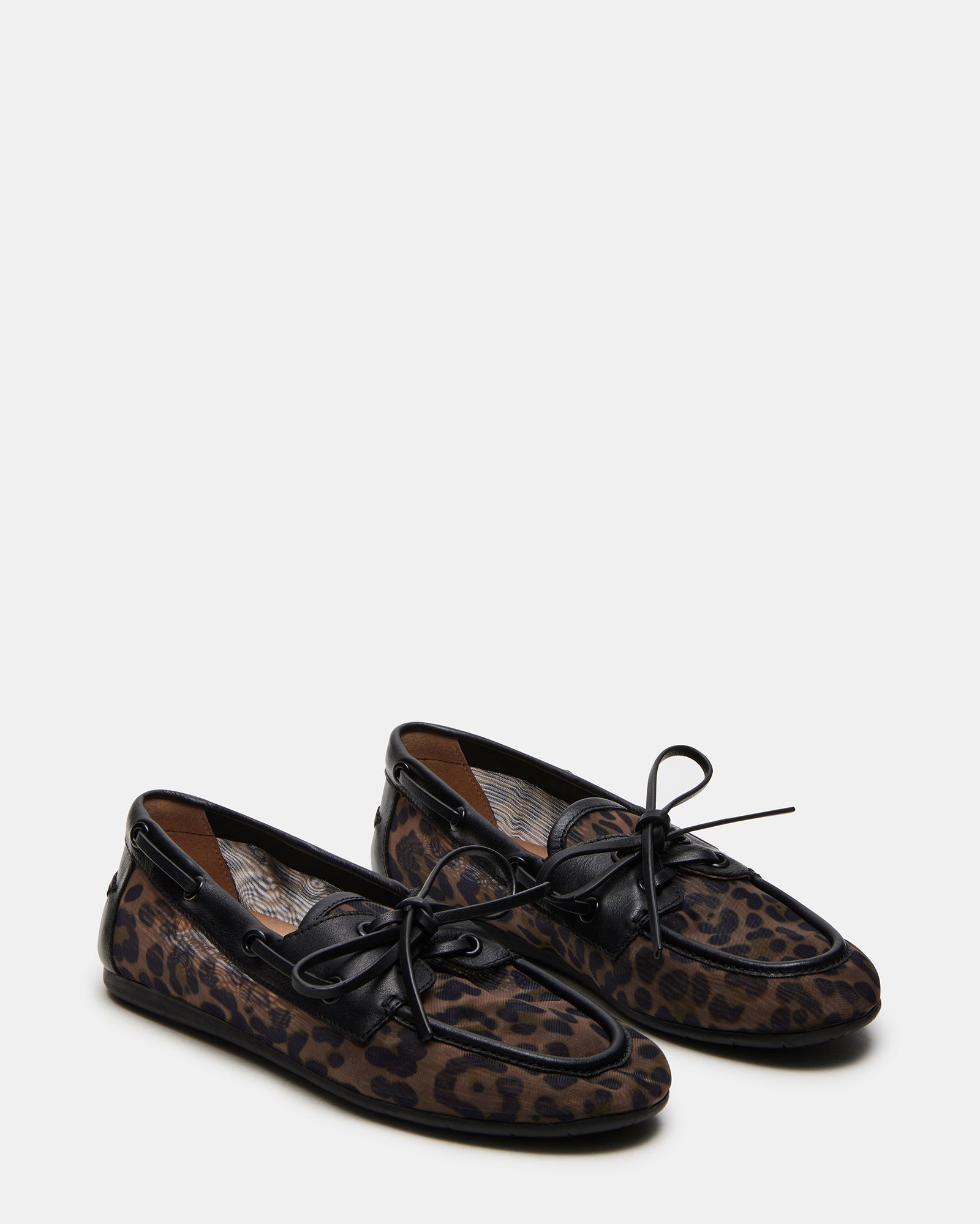 Man wearing stylish loafers for men with casual outfit outdoors