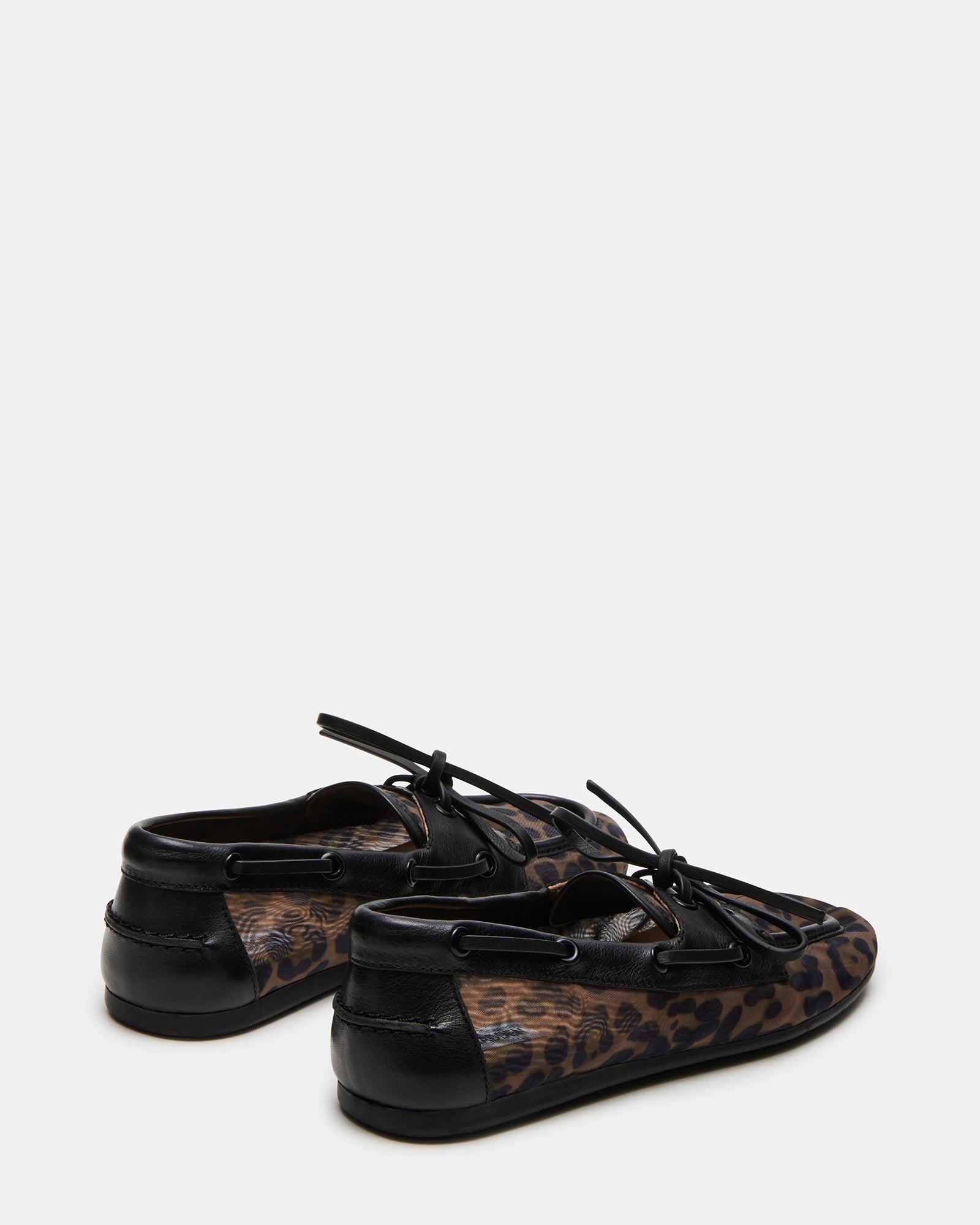 Man wearing stylish loafers for men with casual outfit outdoors