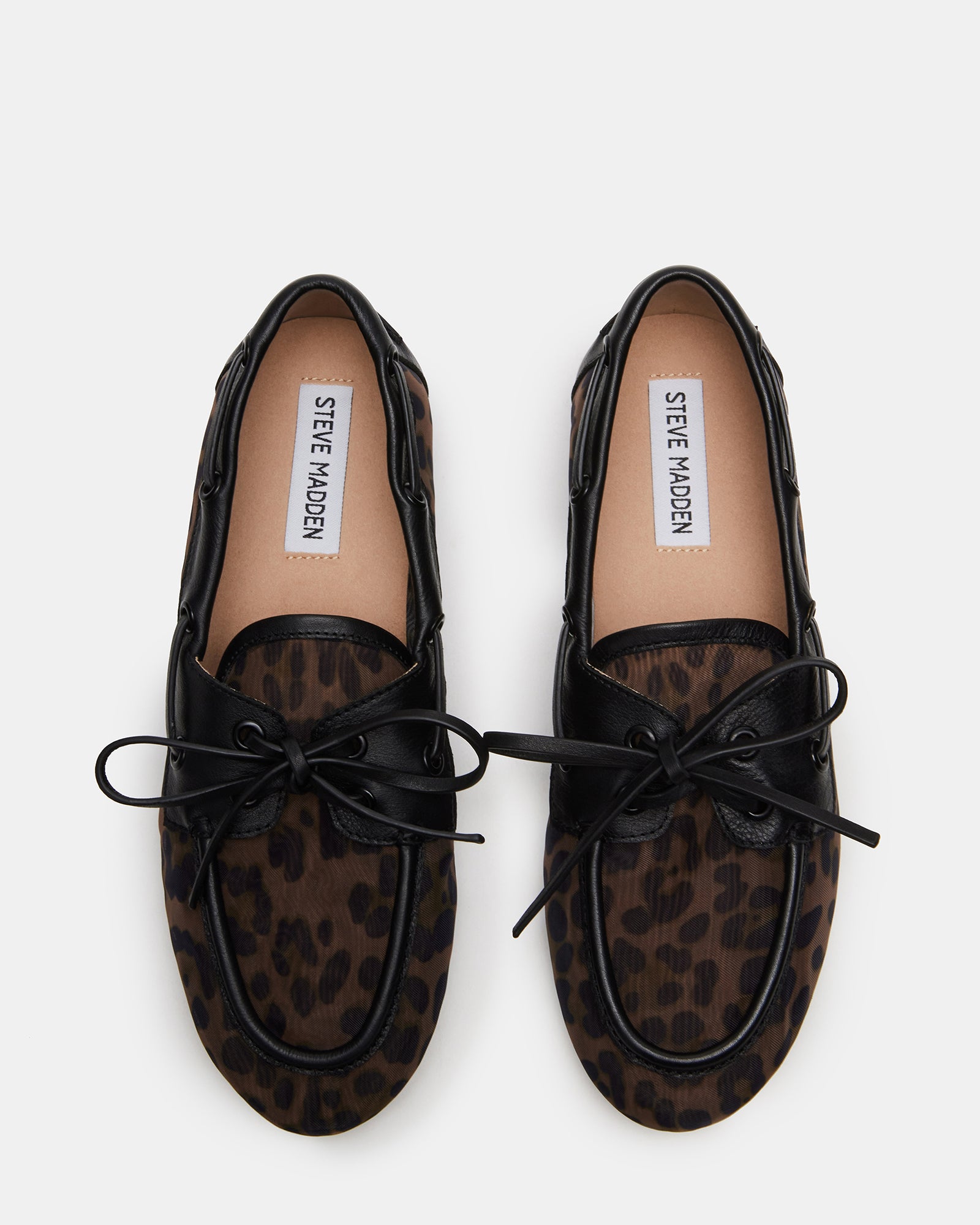 Close-up of SAG black leopard loafers showing textured upper and sleek design