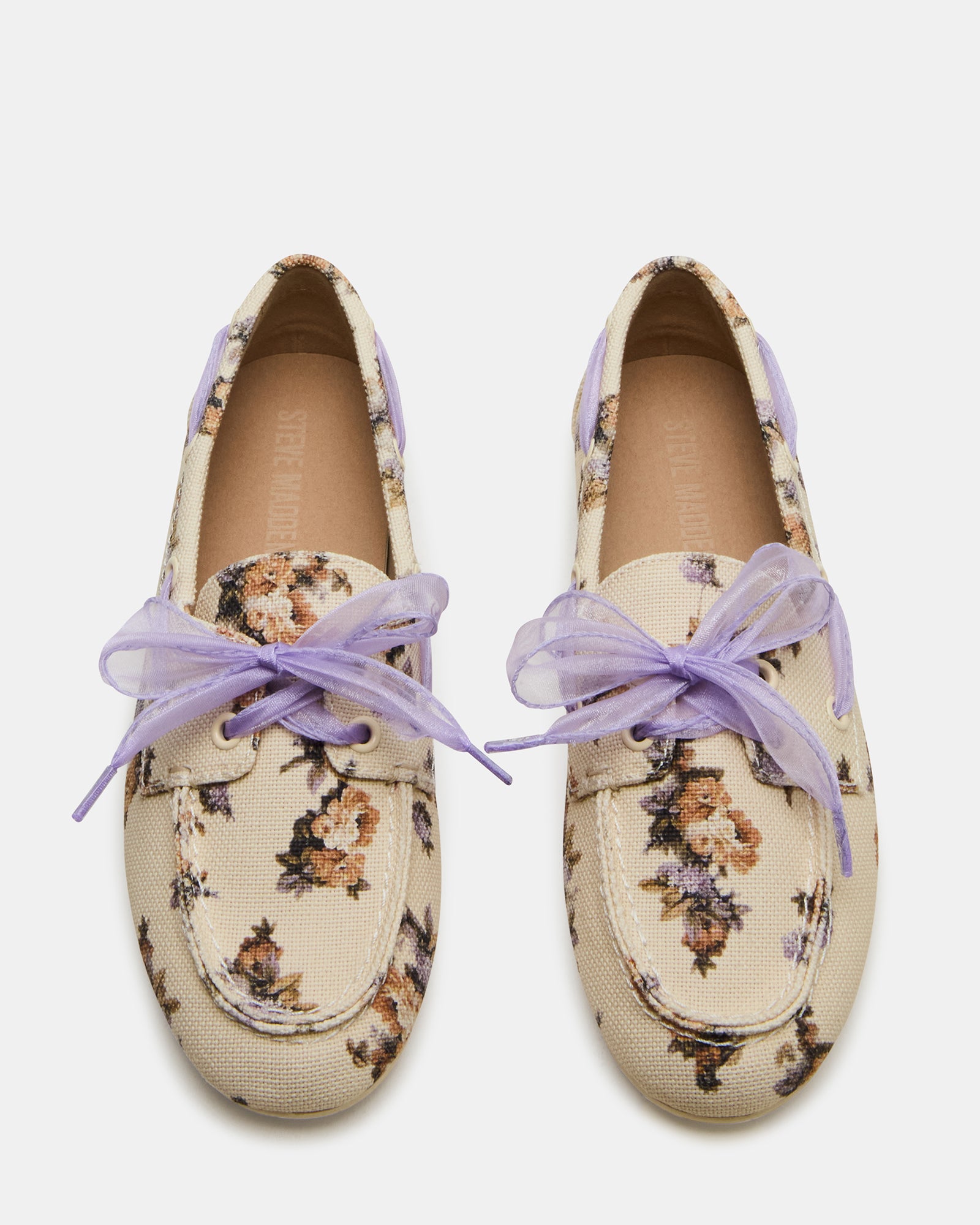 SAG Floral Loafers paired with slim-fit trousers for a polished look