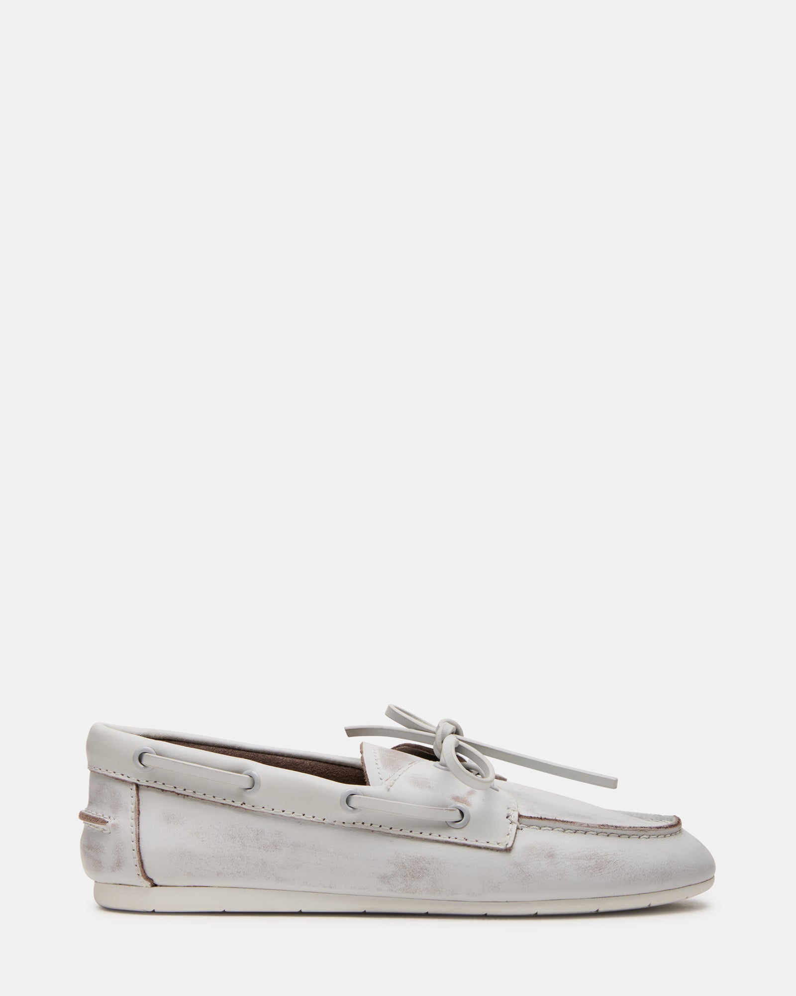 Front view of sleek white leather loafers for men