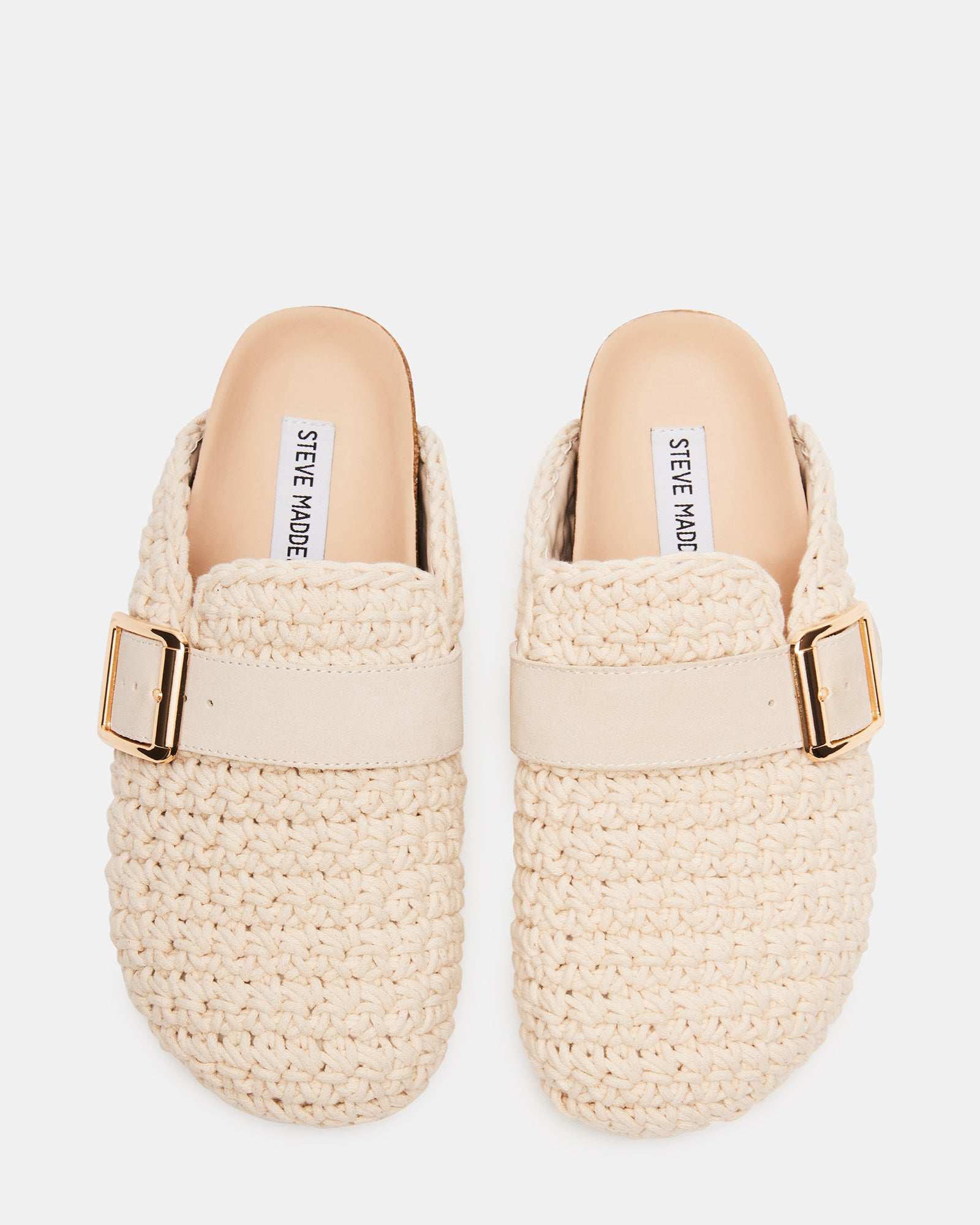 Close-up of cork wrap sole on the Timeless Knit Cream Clogs for added texture.