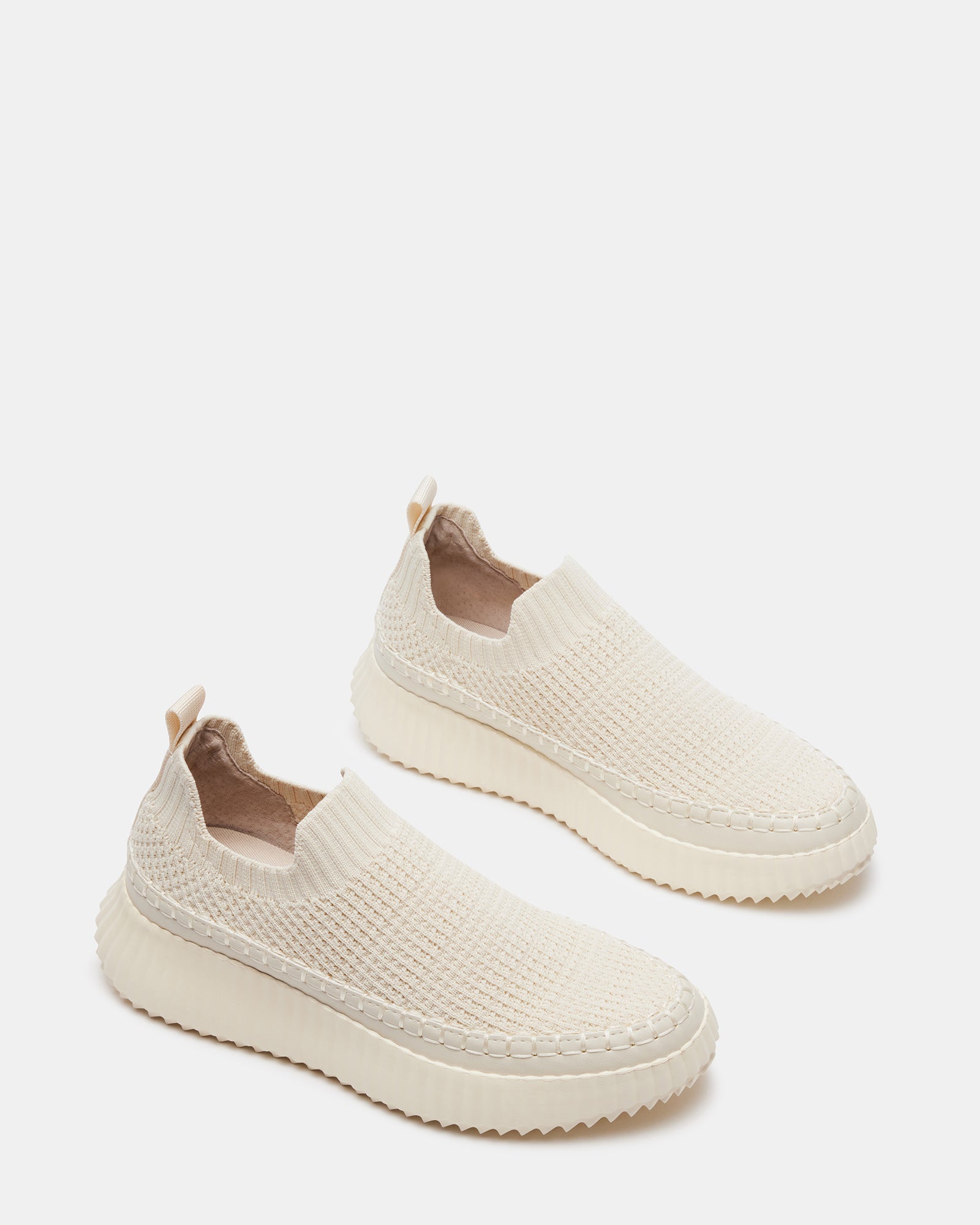 Back view showcasing the ridged platform sole of mens slip on sneakers.
