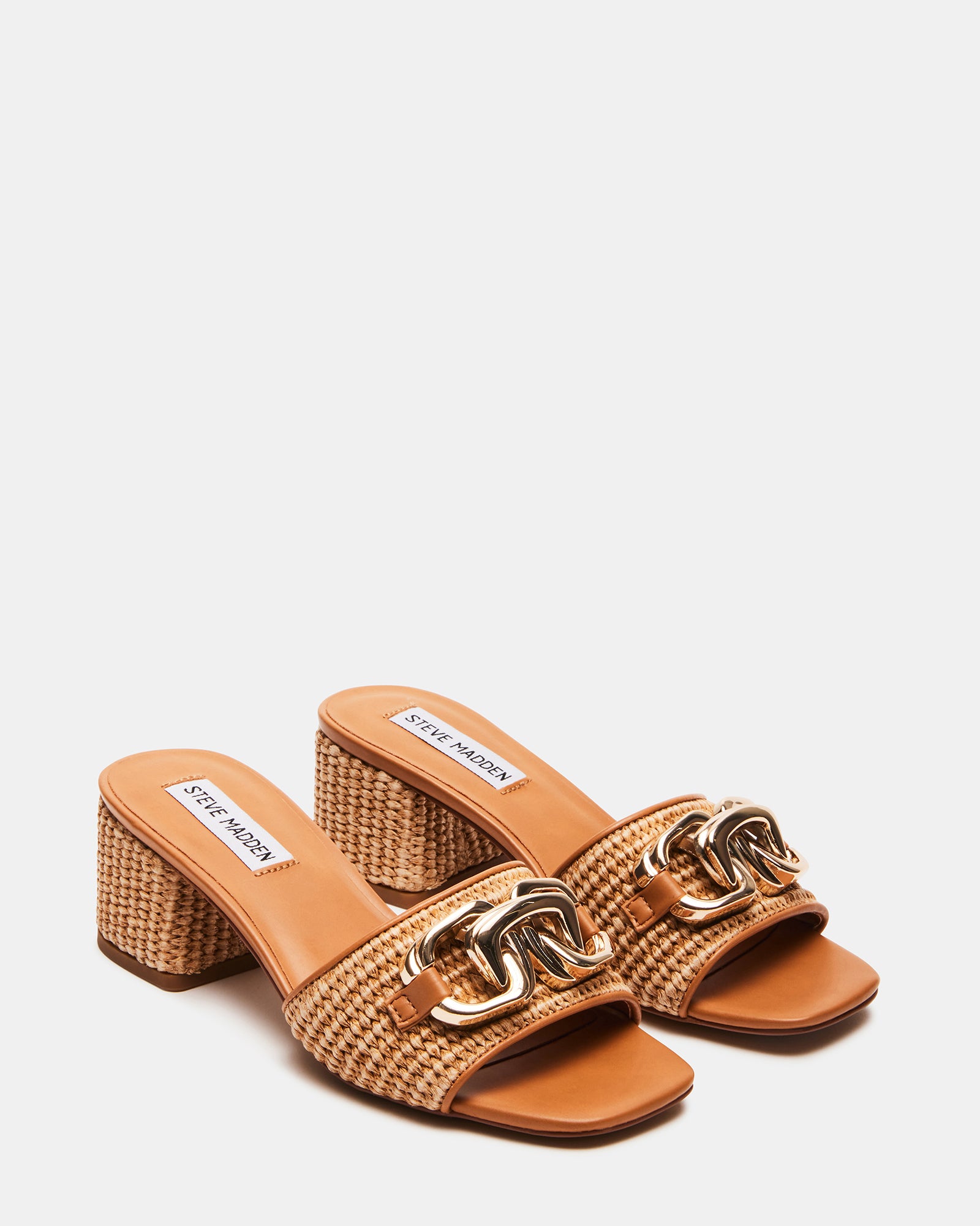 Top-down angle of nude block heel sandals, highlighting square toe and slip-on design