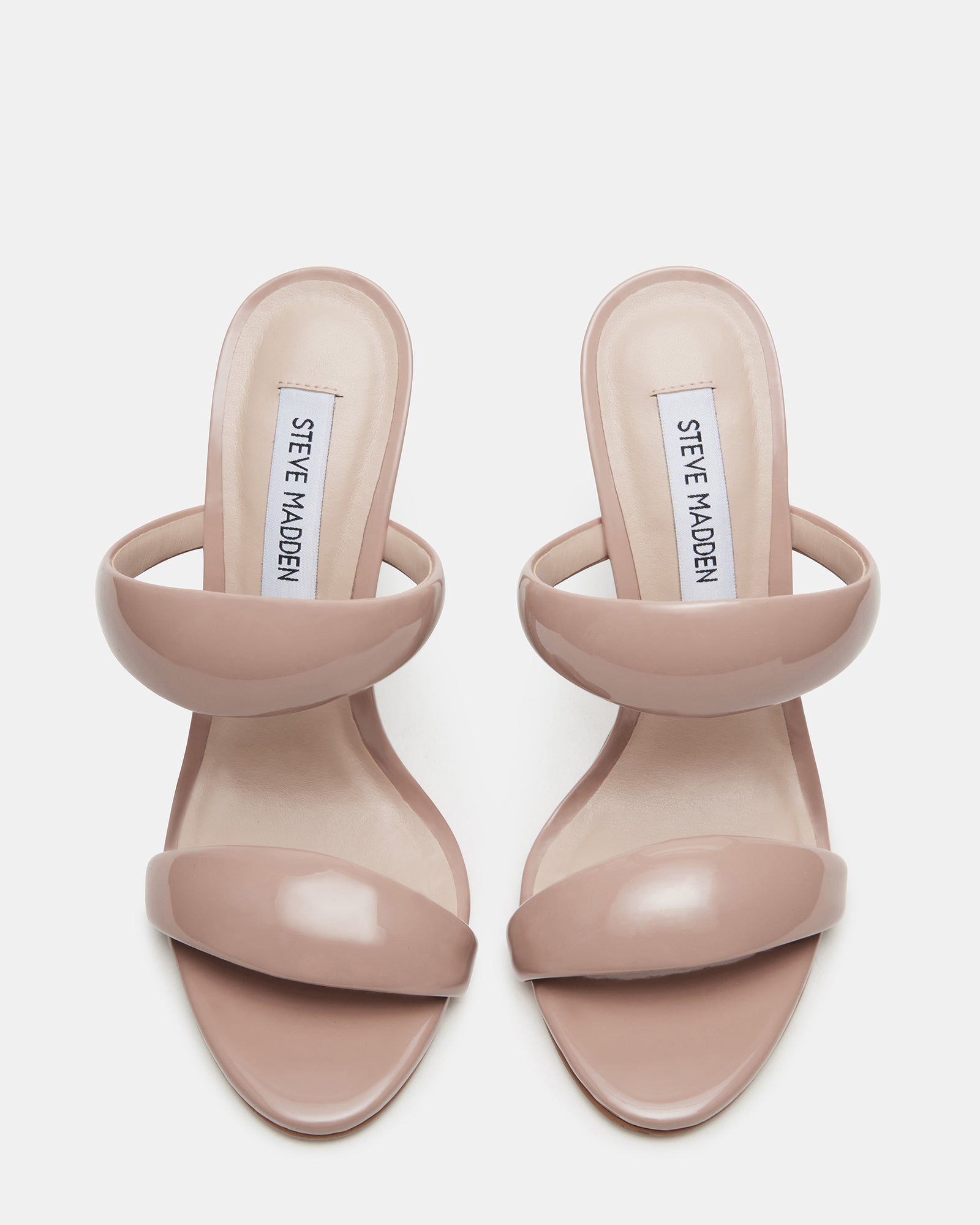 Close-up of the stiletto heel of Saturn Blush mules, highlighting the elegant design.