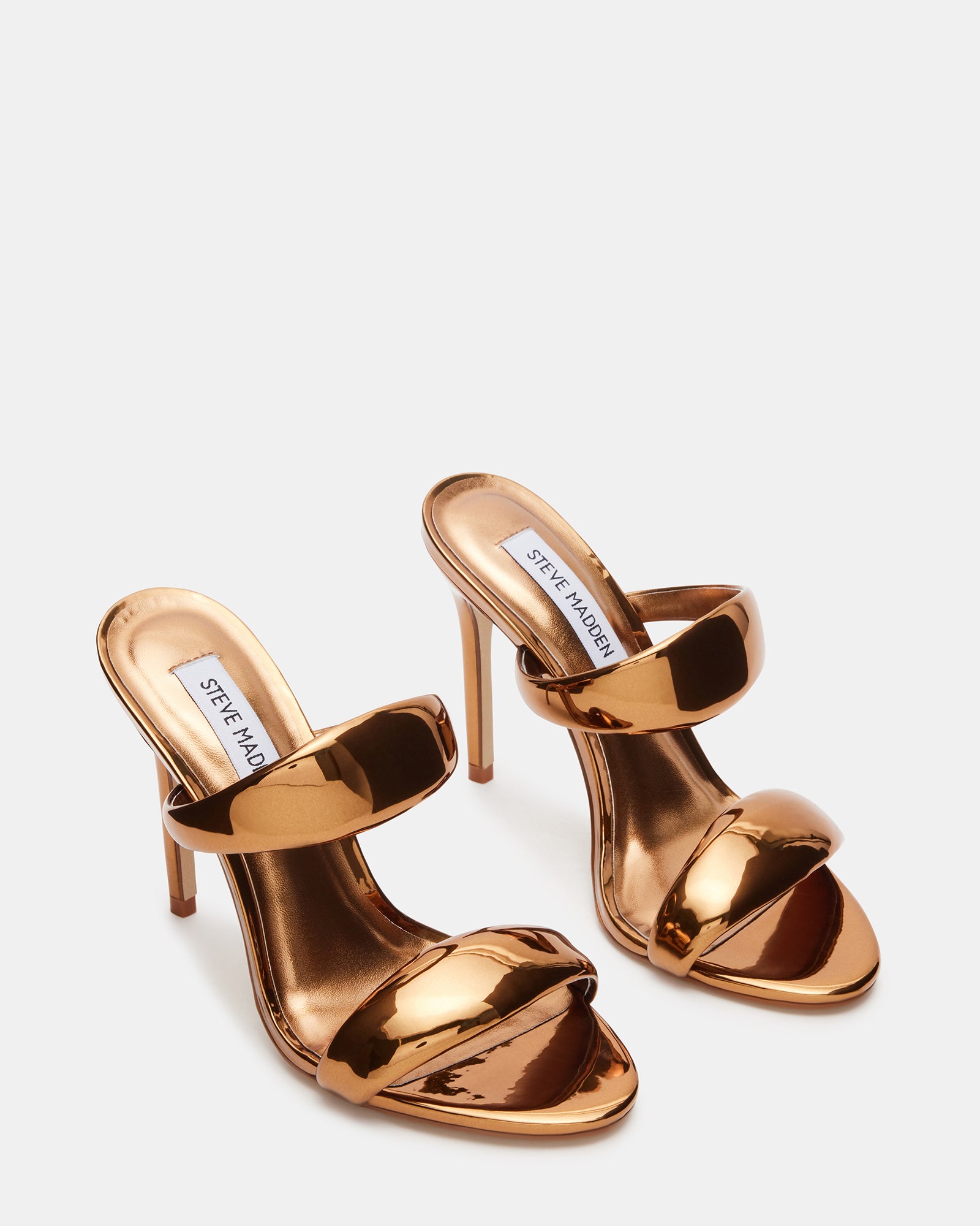 Close-up of the double strap design on gold high heel sandals