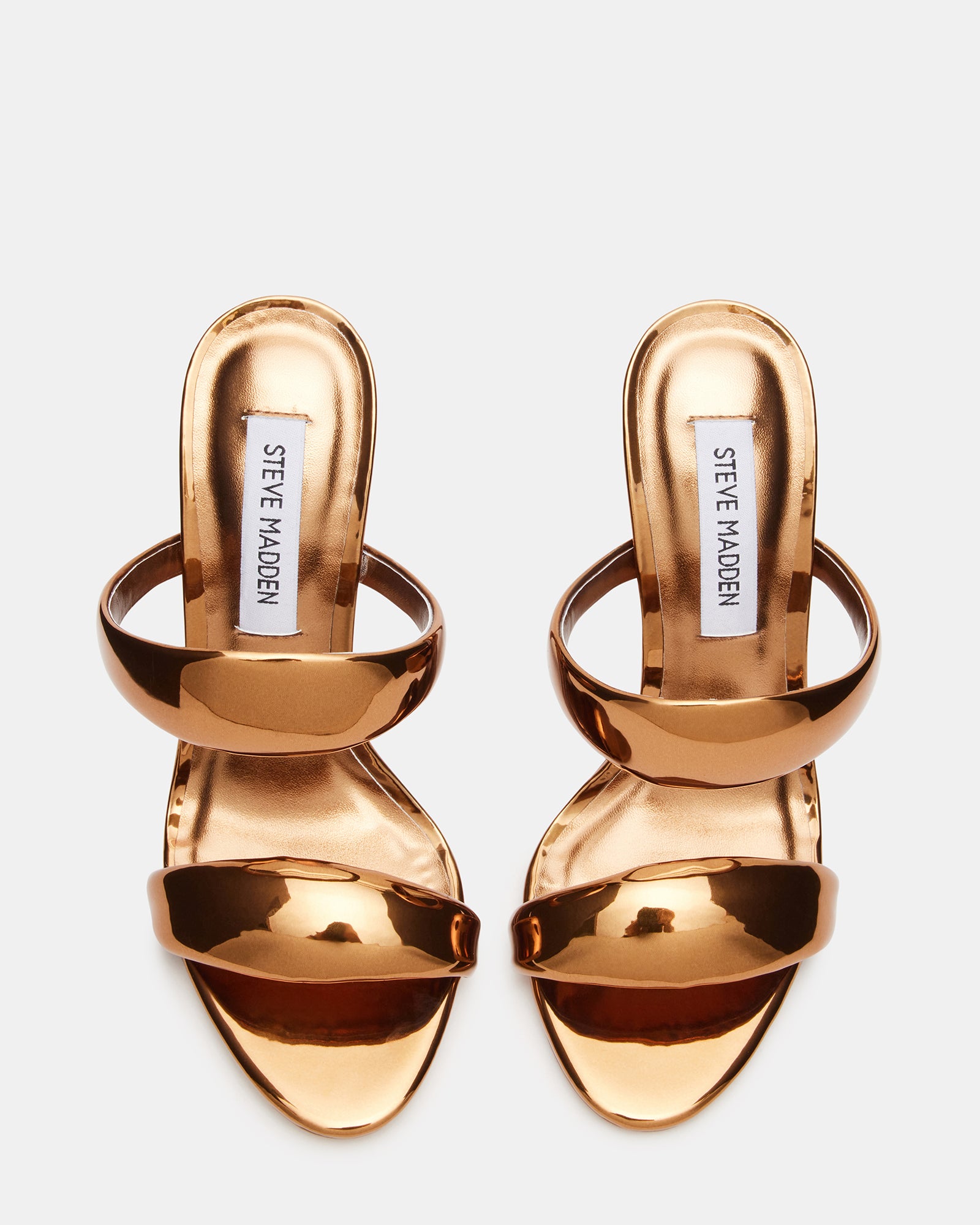Front angle showcasing mule sandals in gold