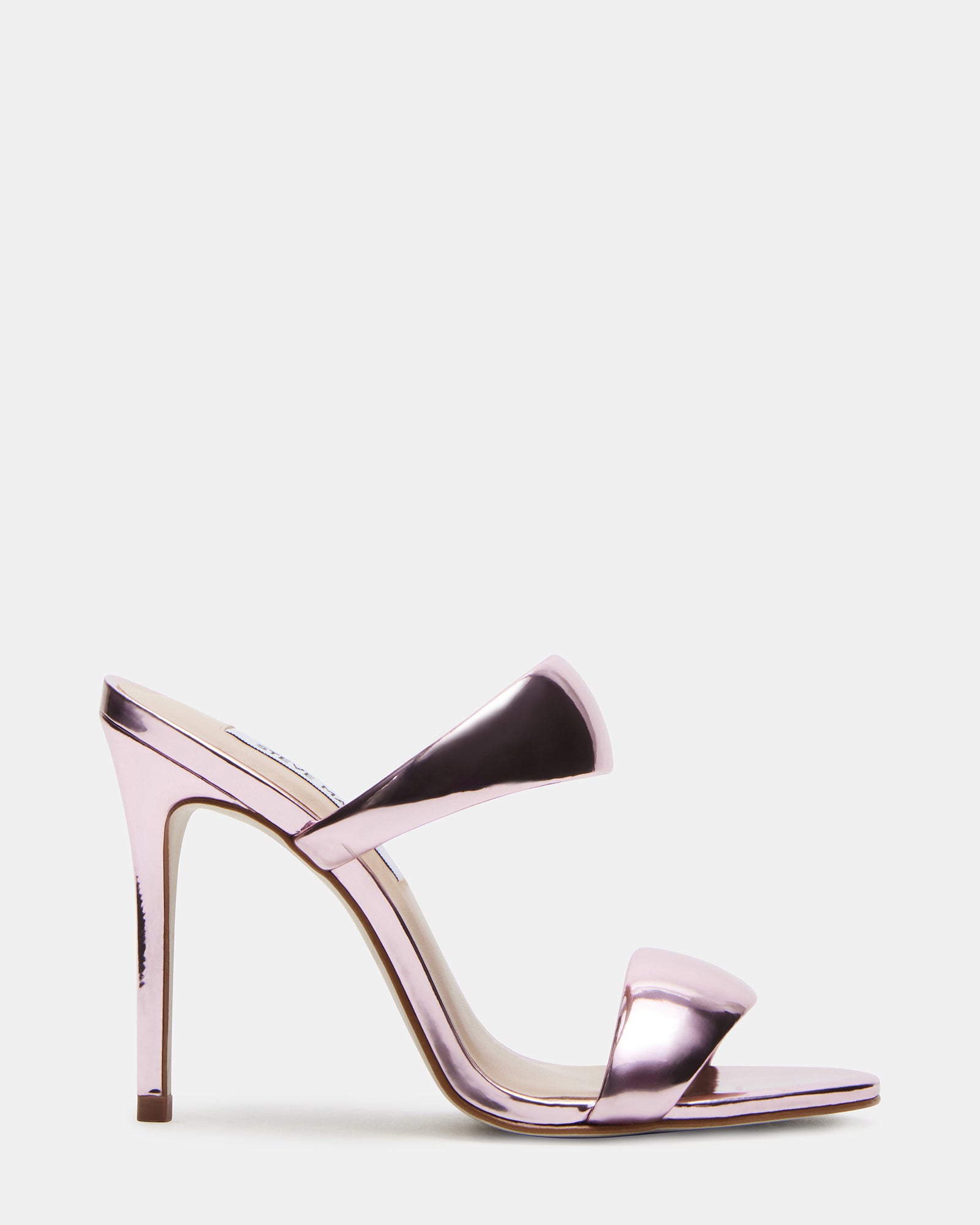 Close-up of Saturn pink metallic mule heels showing stiletto heel detail