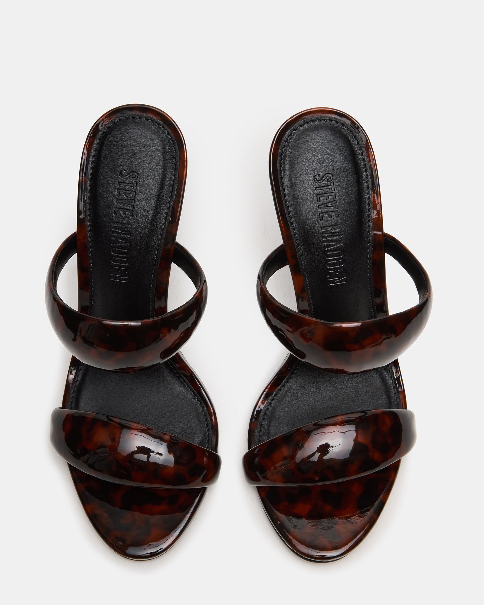 Side view of Saturn Tortoise sleek mule heels with stiletto heel and double strap