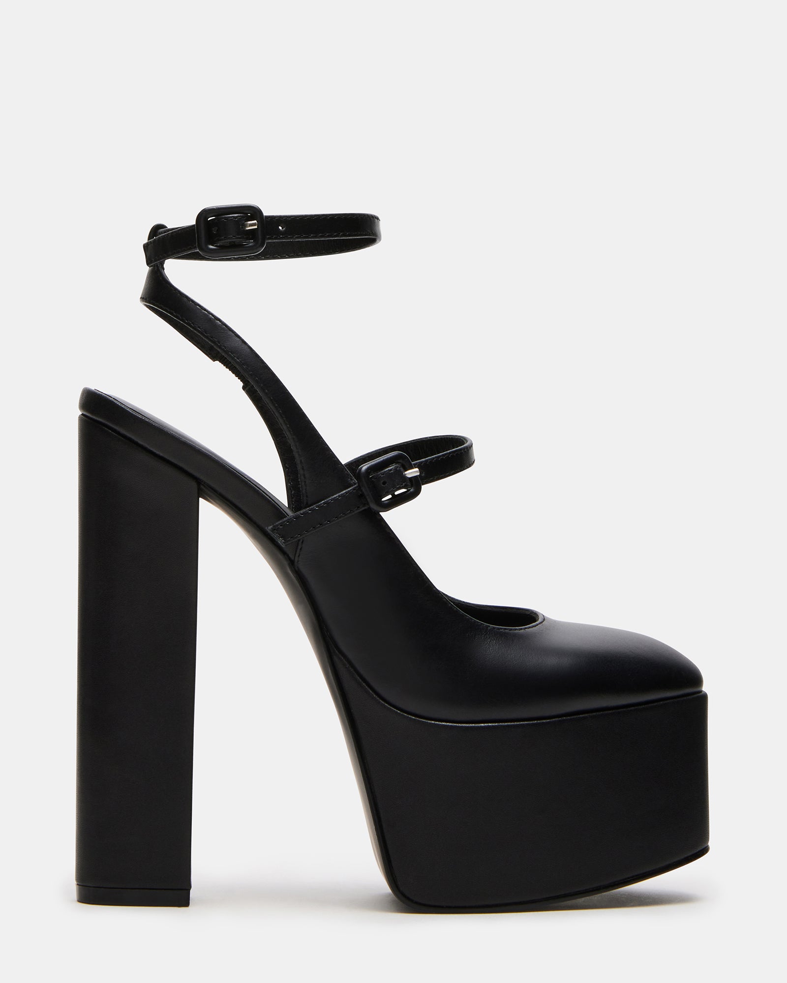 Side view of black leather platform block heels with ankle strap