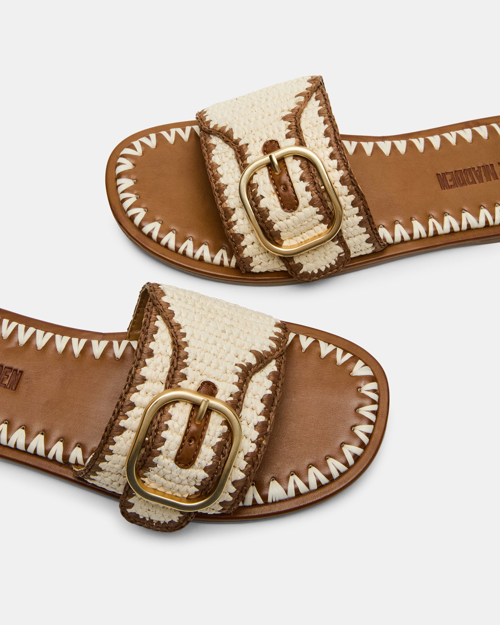 Tan raffia sandals styled with lightweight resort wear for women
