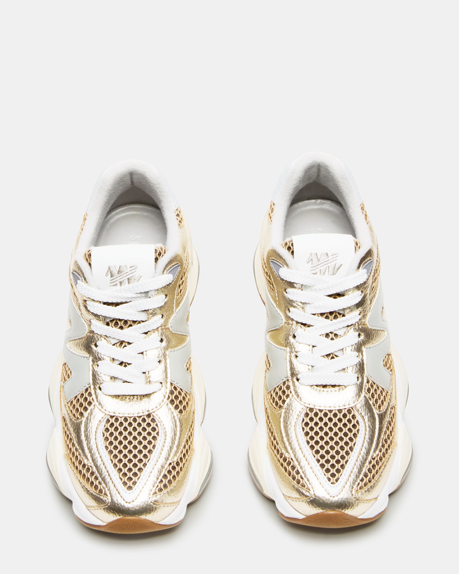 SEBI sneakers styled with workwear, showing heel height and comfort